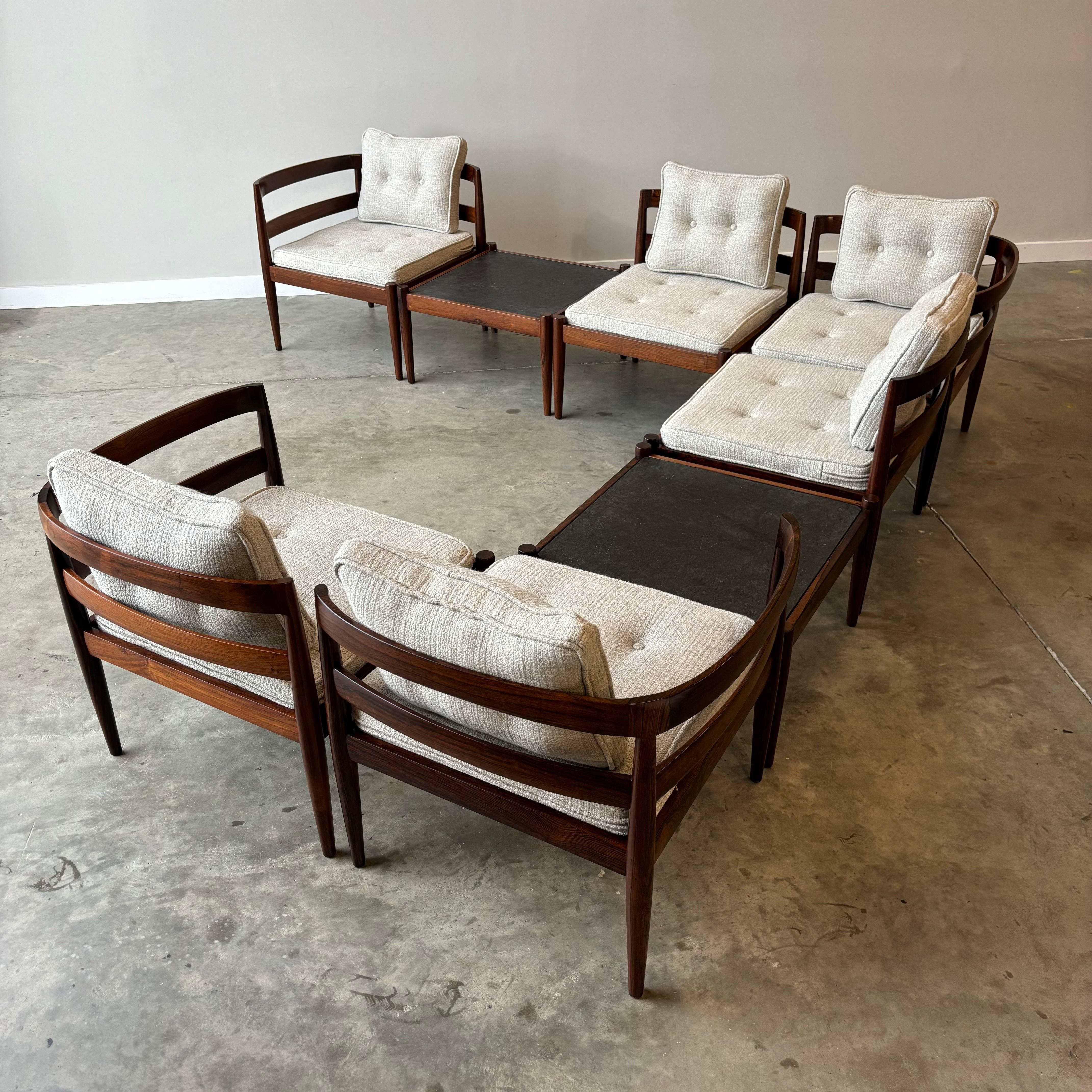 A versatile rosewood seating group by Kai Kristiansen for Magnus Olesen.  This large modular set was purchased at the famed Copenhagen retailer Illums Bolighus in the 1960s.  
Each piece measures about 24