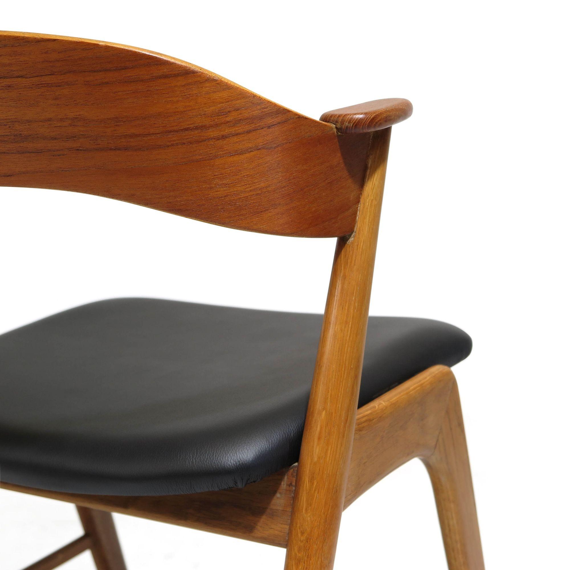 Danish Kai Kristiansen Oak and Teak Curved Back Dining Chairs For Sale