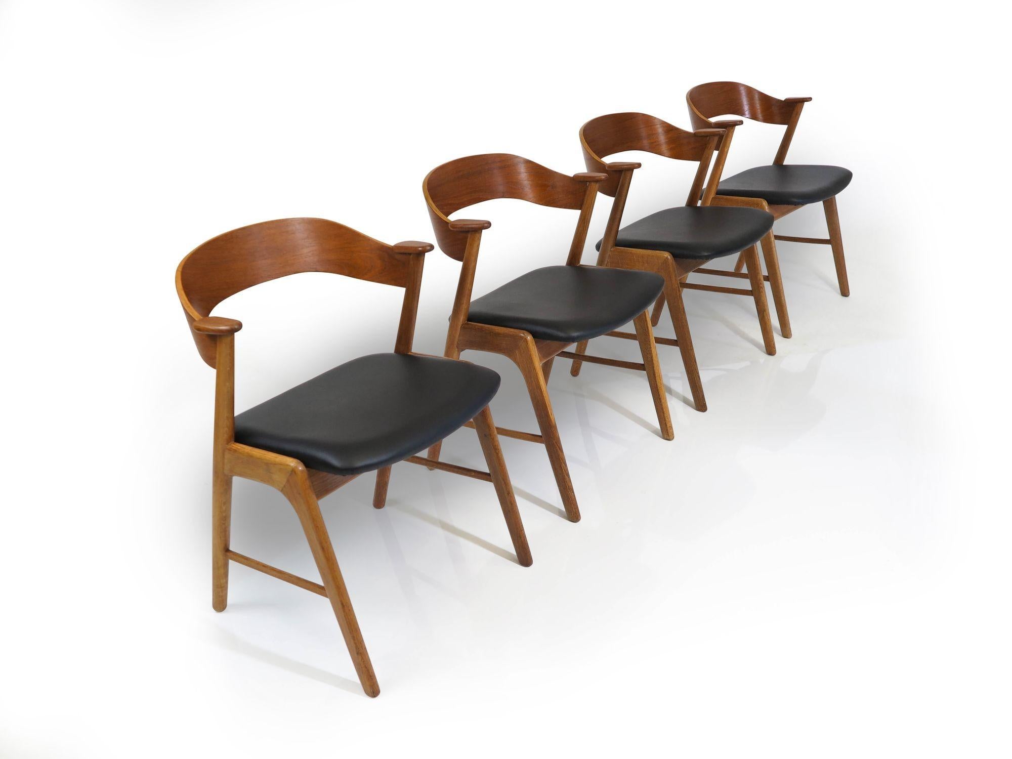 Kai Kristiansen Oak and Teak Curved Back Dining Chairs In Excellent Condition For Sale In Oakland, CA
