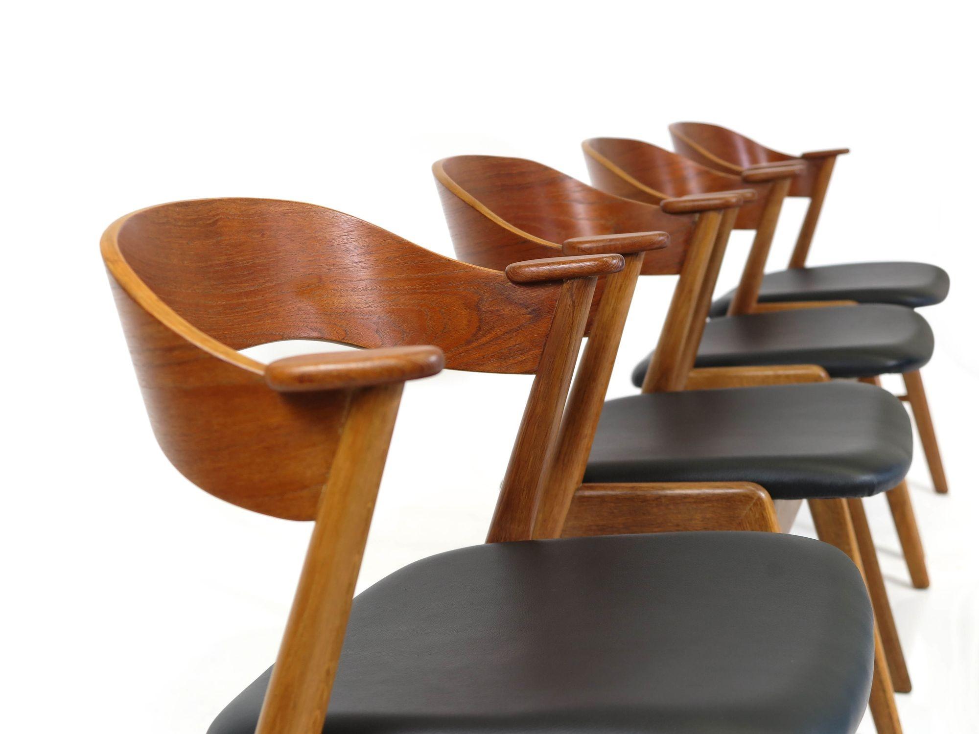20th Century Kai Kristiansen Oak and Teak Curved Back Dining Chairs For Sale