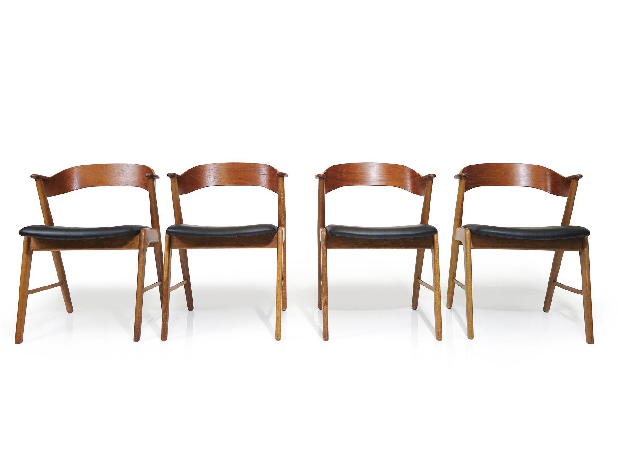 Leather Kai Kristiansen Oak and Teak Curved Back Dining Chairs For Sale