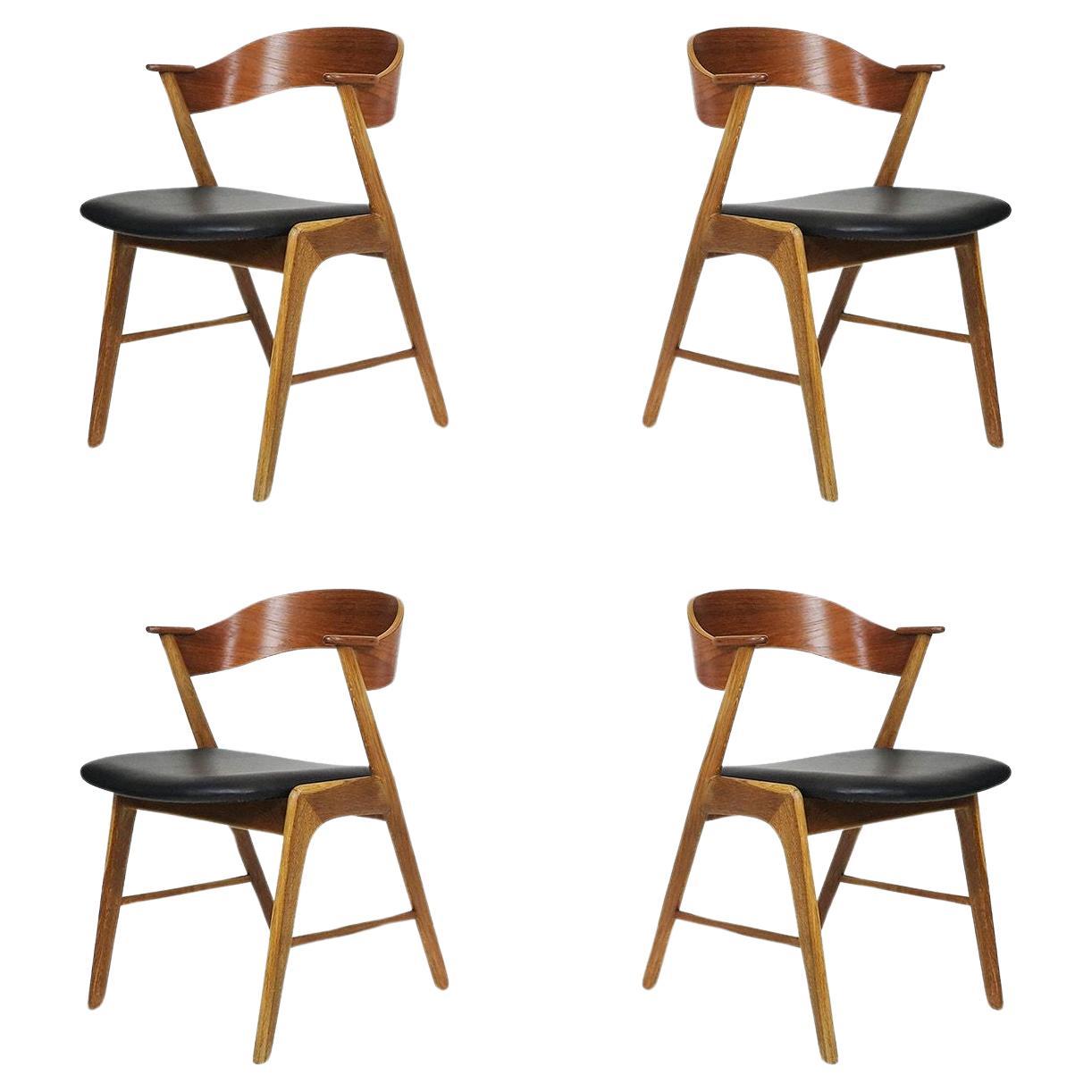Kai Kristiansen Oak and Teak Curved Back Dining Chairs For Sale