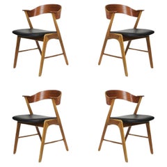 Kai Kristiansen Oak and Teak Curved Back Dining Chairs