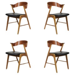 Kai Kristiansen Oak and Teak Curved Back Dining Chairs