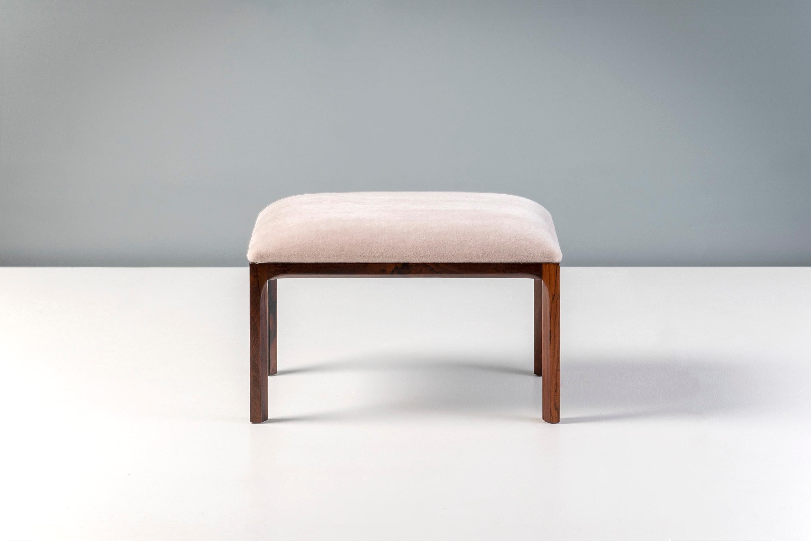 Kai Kristiansen - Rosewood Ottomans, c1950s.

Elegant rosewood frame ottomans produced by Aksel Kjersgaard in Denmark c1950s. The seats have been reupholstered in a blush pink Pierre Frey long-pile Teddy mohair.

W: 50cm  /  H: 41cm  /   D: 37cm
