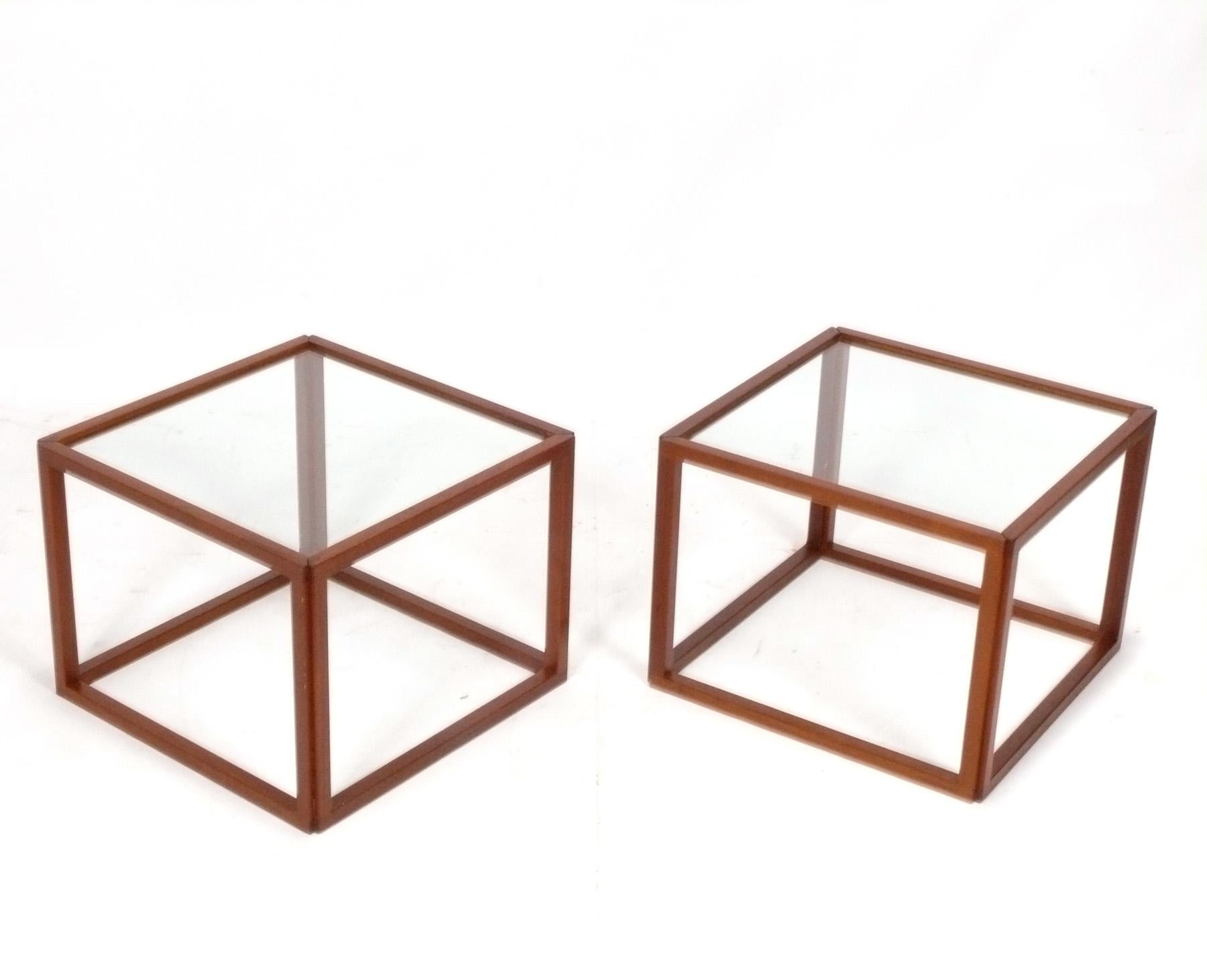 Clean Lined Pair of Mid Century Modern Teak Cube Tables, designed by Kai Kristiansen, Denmark, circa 1960s. They have been cleaned and Danish oiled. They are a versatile size and can be used as side or end tables, night stands, or pushed together to