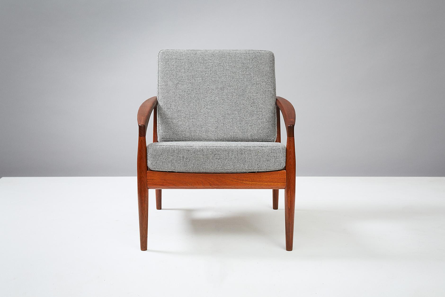 Hans Wegner

GE-270 chair, 1956.

Produced by GETAMA, Gedsted, Denmark. Teak frame with exposed brass fittings. New cushions covered in Kvadrat Hallingdal #130 wool fabric.