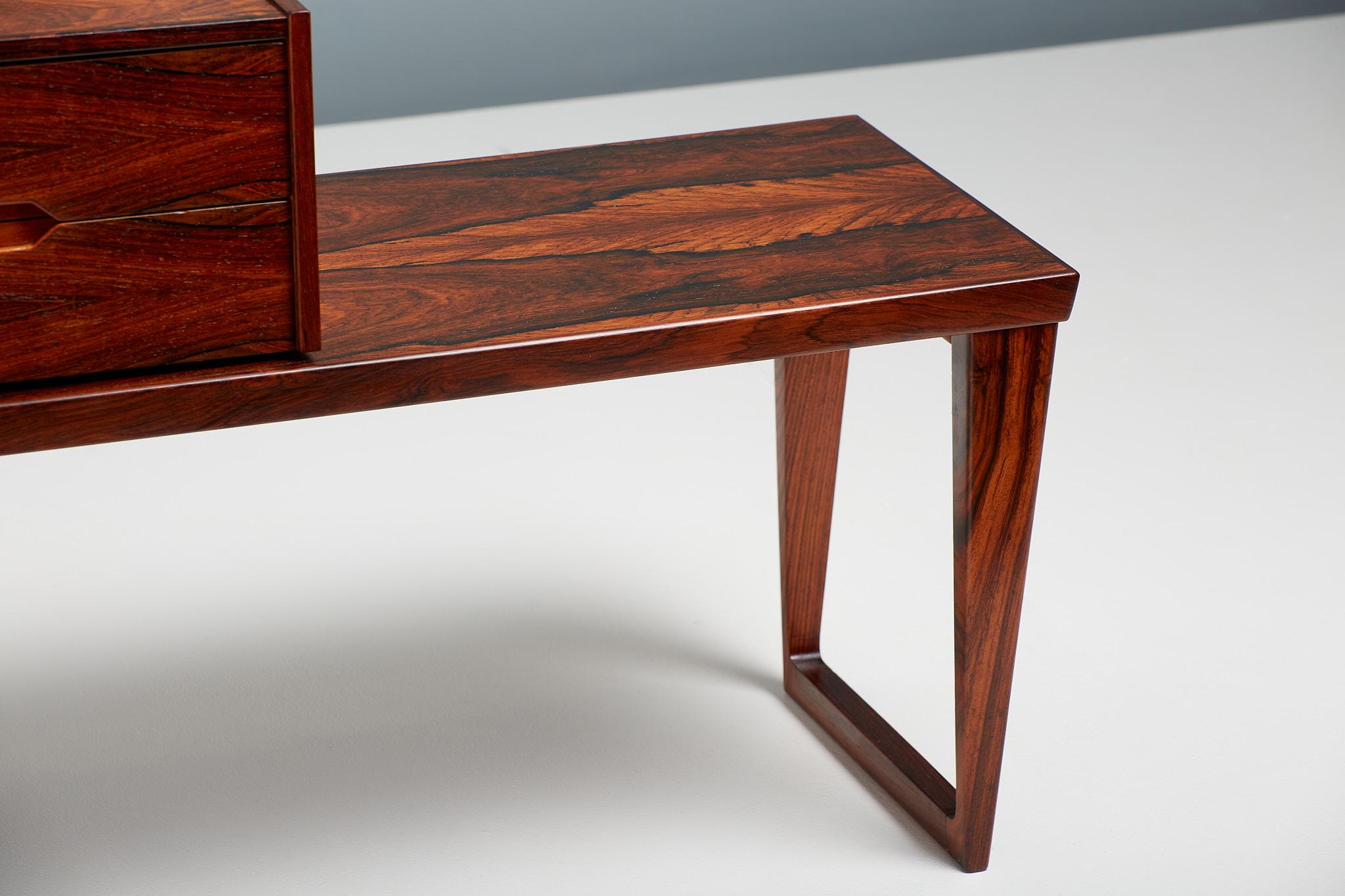 Stunning, exotic grained rosewood bench with matching, loose standing two-drawer unit which can be positioned anywhere along the bench surface. This piece was designed by Danish design icon Kai Kristiansen and produced by Aksel Kjersgaard in Odder,