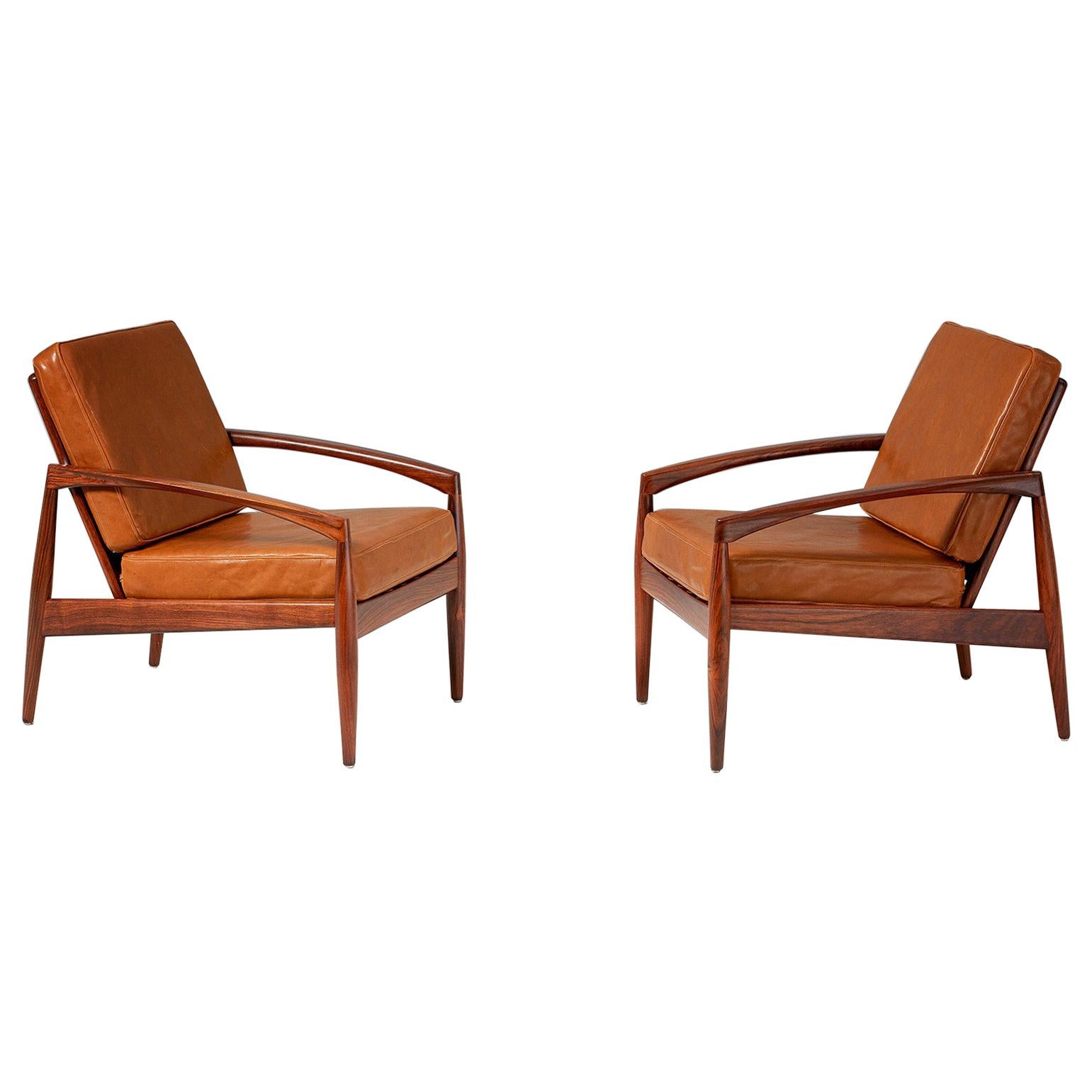 Kai Kristiansen Rosewood Lounge Chairs with Cognac Leather Cushions