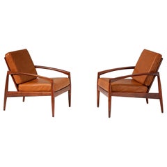 Kai Kristiansen Rosewood Lounge Chairs with Cognac Leather Cushions