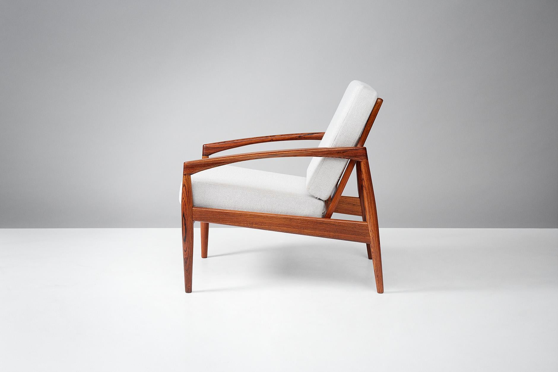 Kai Kristiansen

Paper knife lounge chair, 1955.

Produced by Magnus Olesen, Denmark in solid rosewood. New cushions upholstered in Kvadrat Hallingdal #103 wool fabric.

Other upholstery options available by request.

 