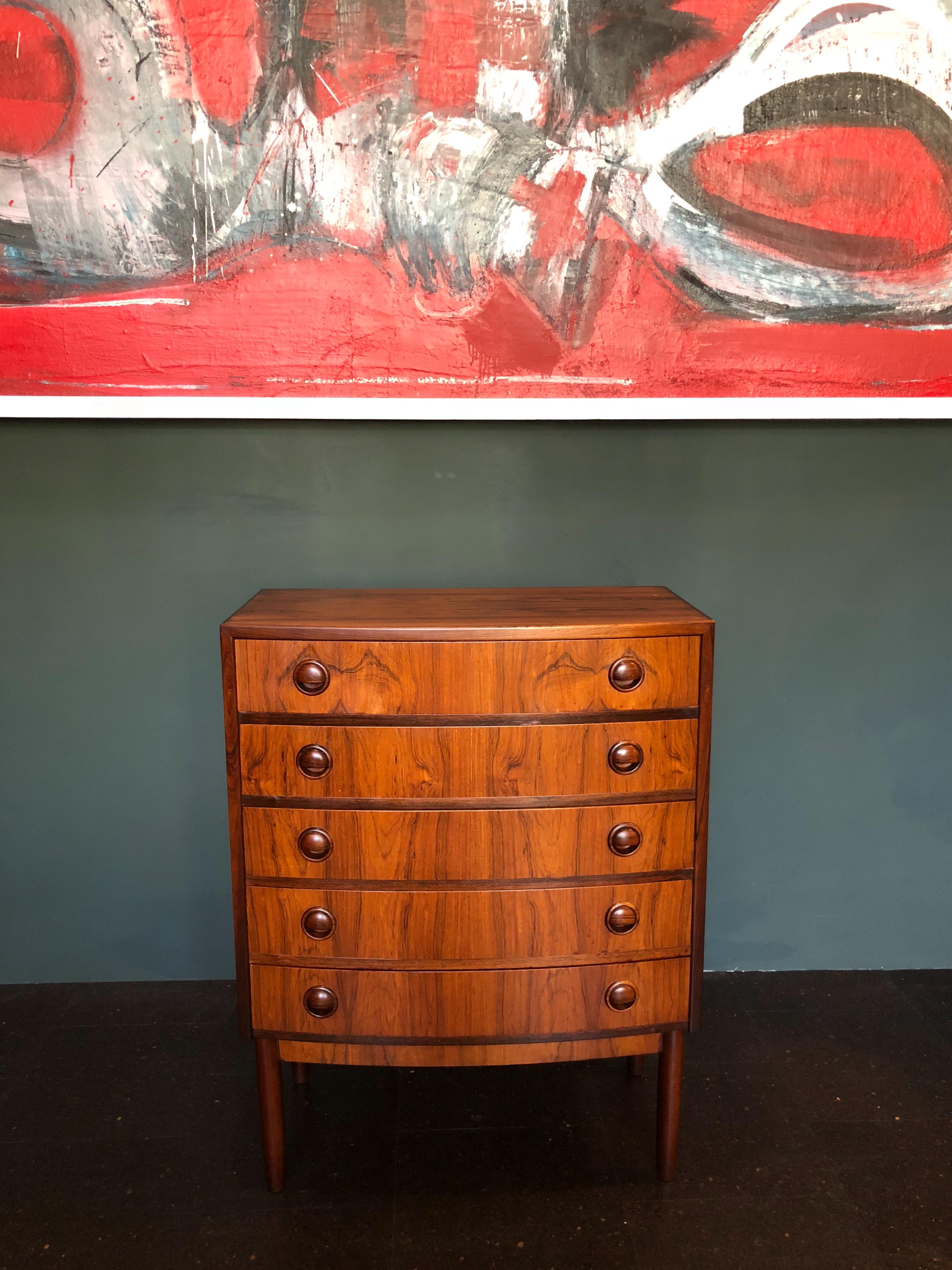 Lovely little chest of drawers by Kai Kristiansen, Denmark 1960. Beautiful colouring to the rosewood and in very good condition throughout.