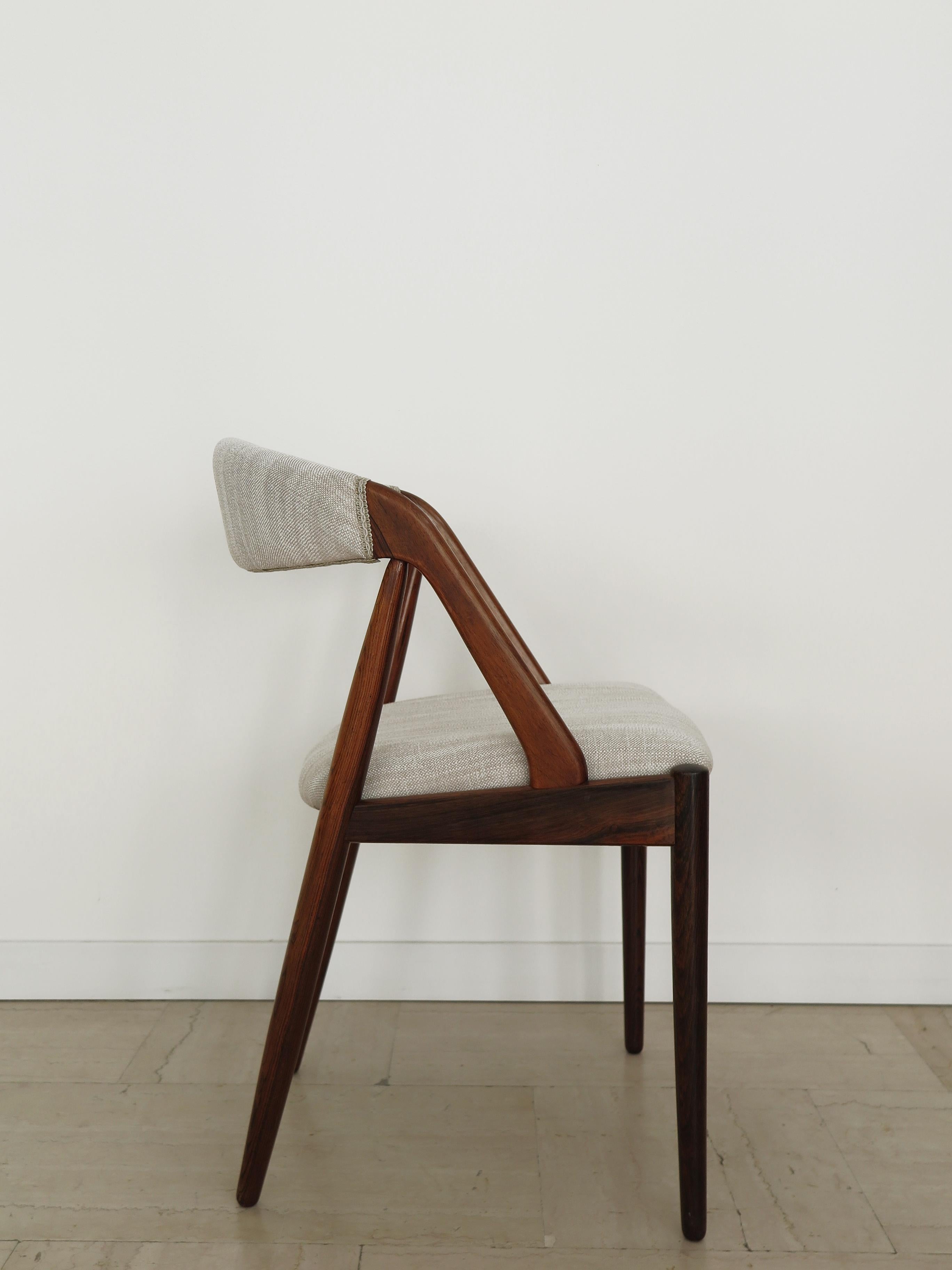 Scandinavian model 31 chair designed by Kai Kristiansen for Schou Andersen with dark solid wood frame and new fabric seat and back, Denmark 1960s production 