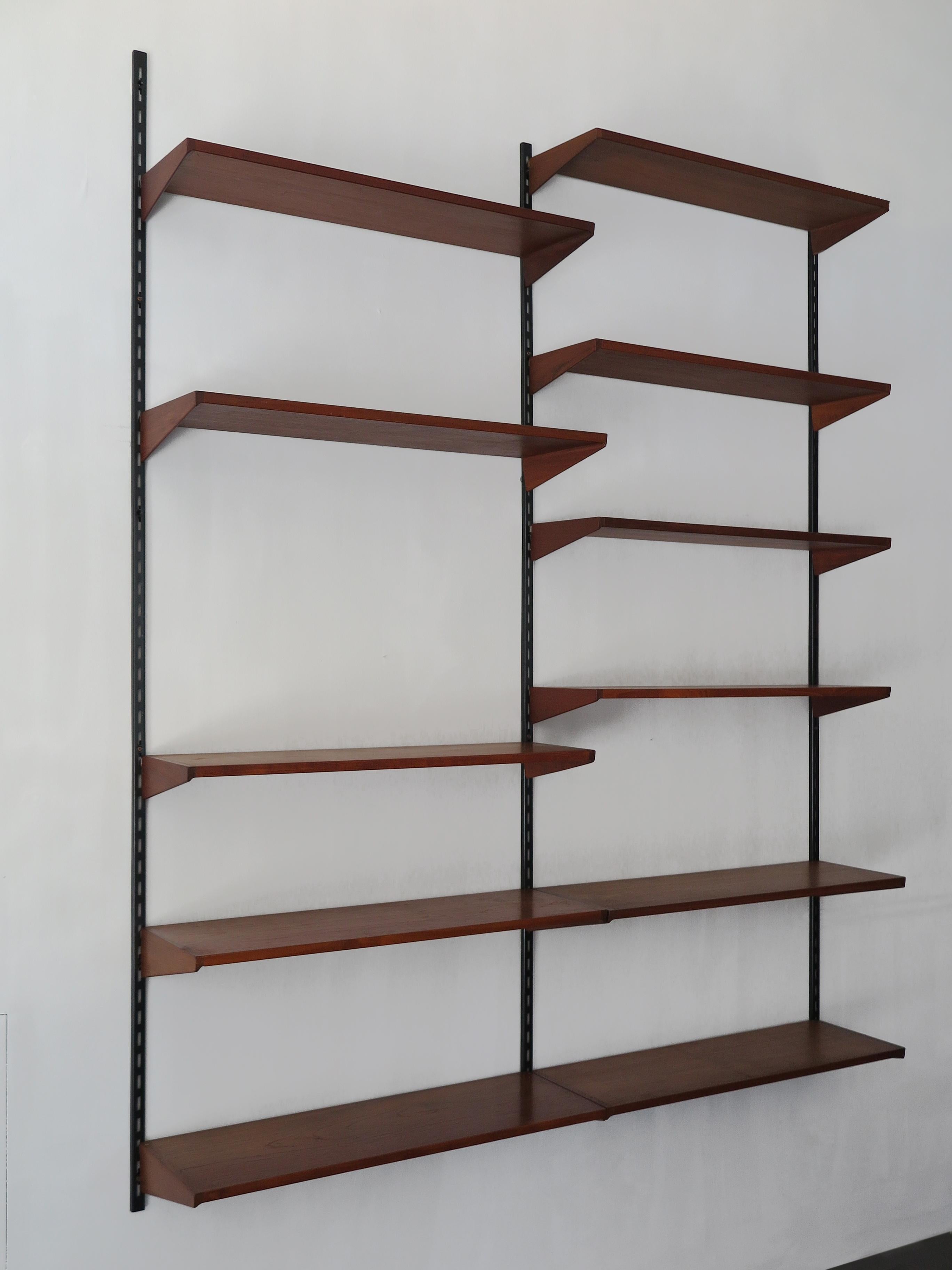 Danish teak shelving system designed by Kai Kristiansen for FM Mobler, shelves can be positioned as desired, circa 1960.
Please note that the item is original of the period and this shows normal signs of age and use.