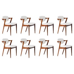 Kai Kristiansen Set of 8 Model 42 Rosewood and Boucle Dining Chairs