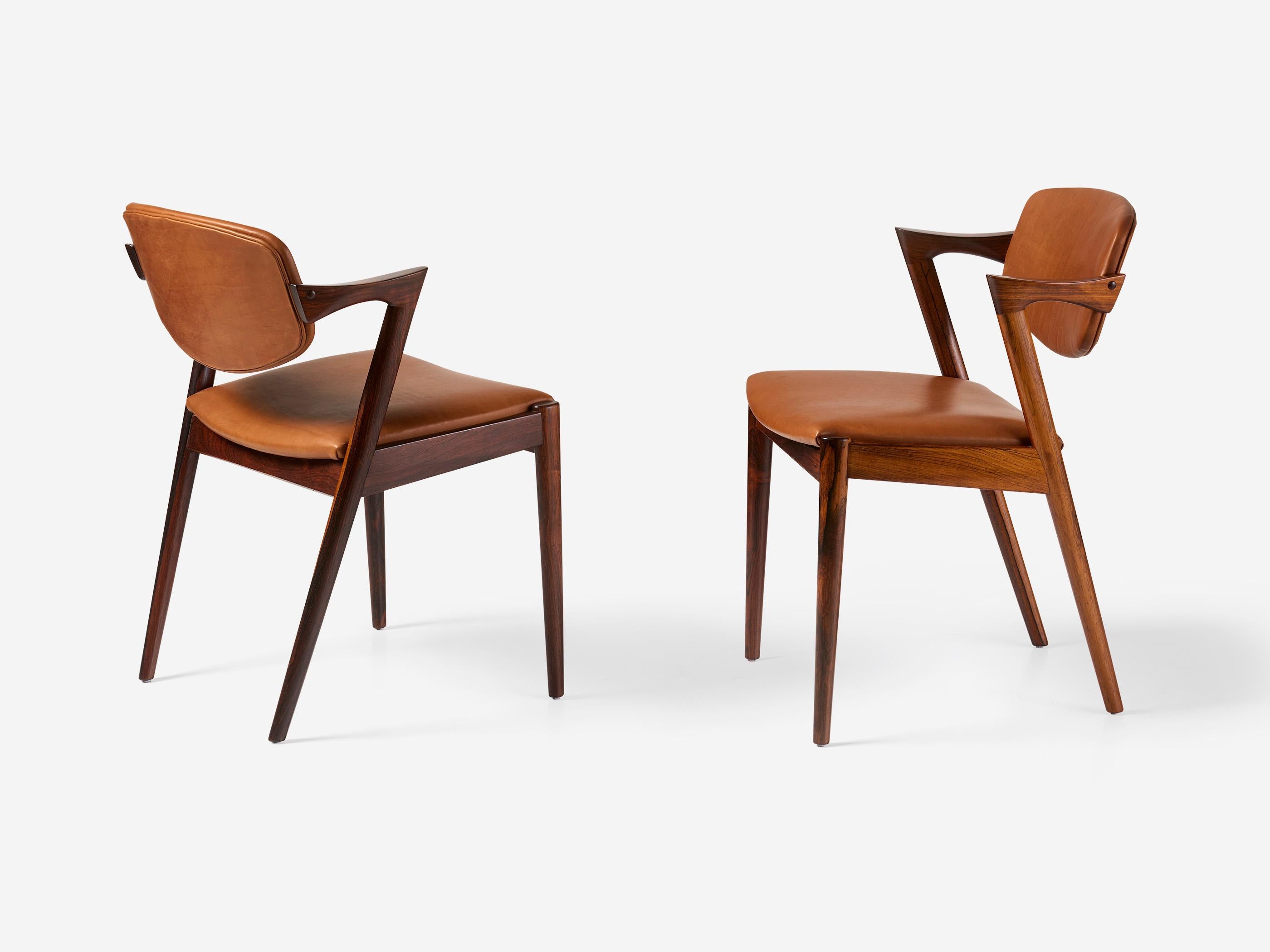Kai Kristiansen Set of 8 Model 42 Rosewood and Leather Dining Chairs en Excelente estado para la venta en London, England
