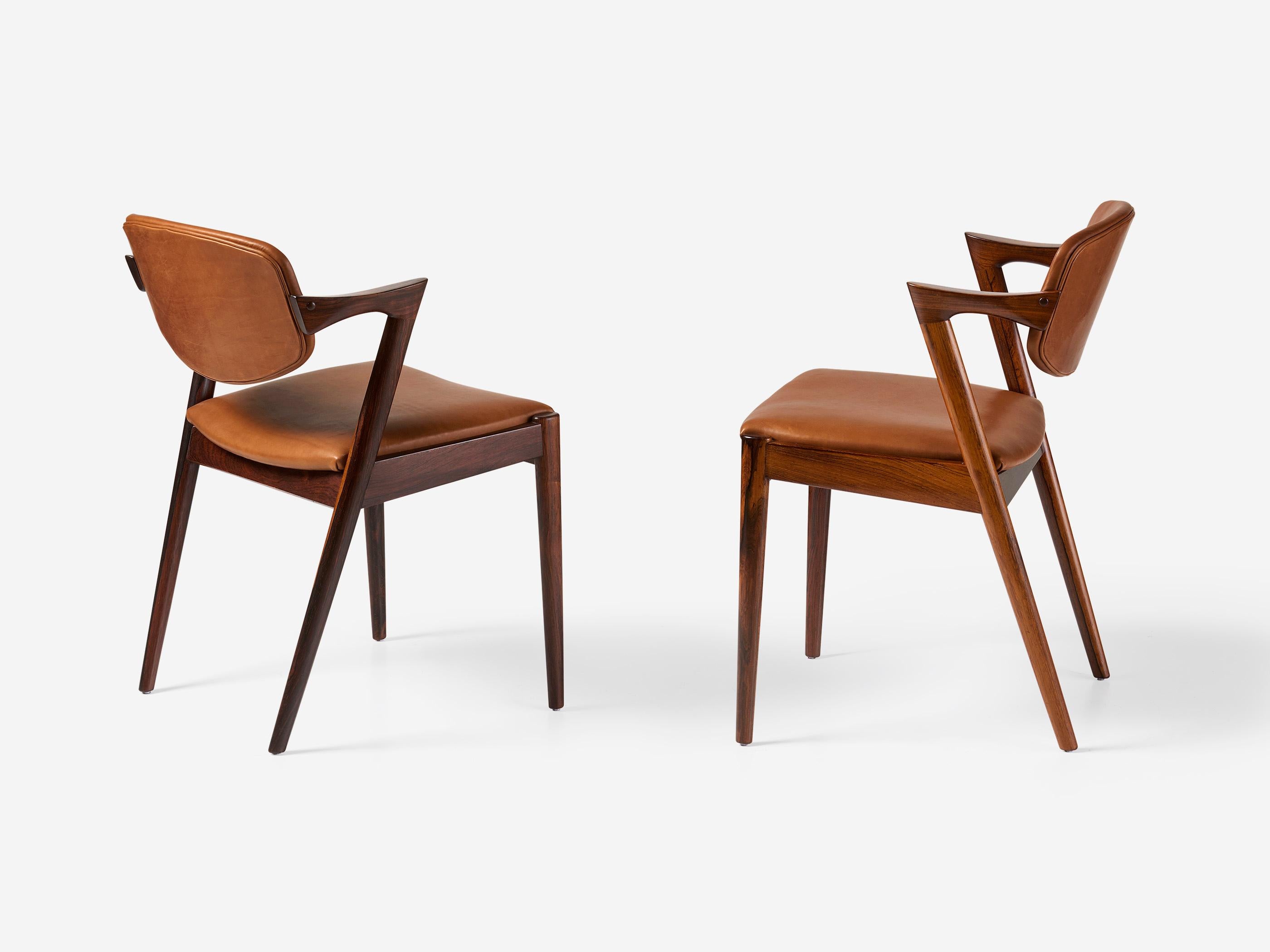 Kai Kristiansen Set of 8 Model 42 Rosewood and Leather Dining Chairs Cuero en venta