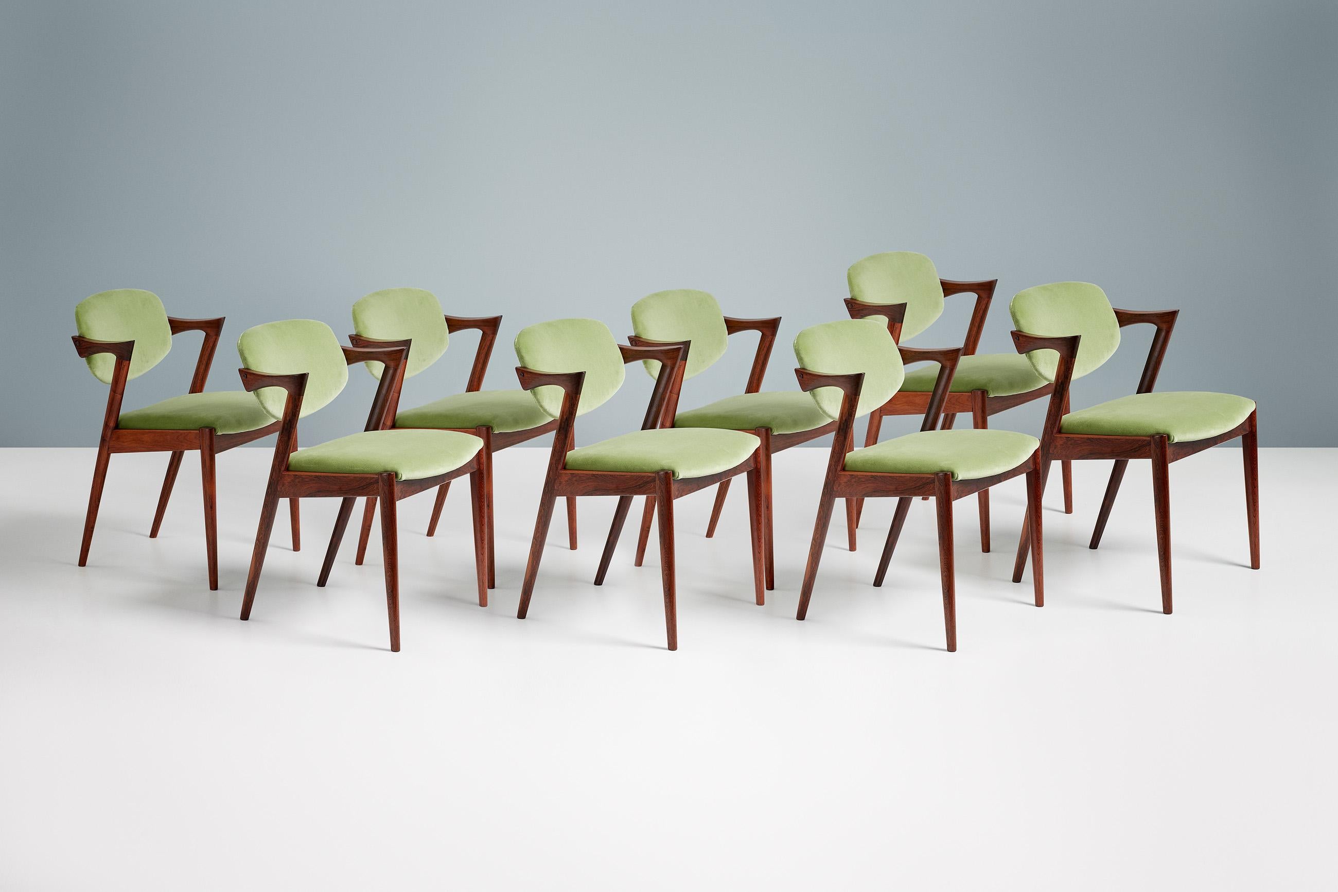 Kai Kristiansen - Chaises de salle à manger modèle 42, 1956.

Ensemble de 8 chaises de salle à manger produites par Skovman Andersen pour le grand magasin Illum Bolighus à Copenhague. Les cadres sont fabriqués à partir de bois de rose de la plus
