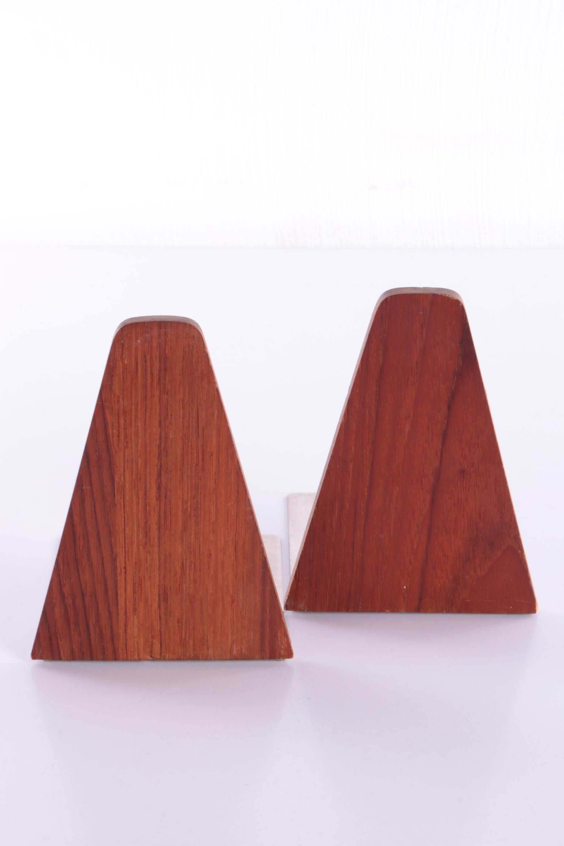 Kai Kristiansen set teak bookends Denmark

Mid-century small teak bookends attributed to Kai Kristiansen, manufactured in the 1960's by Feldballe Møbelfabrik in Denmark, made of solid teak with metal plate base.

In very good vintage condition