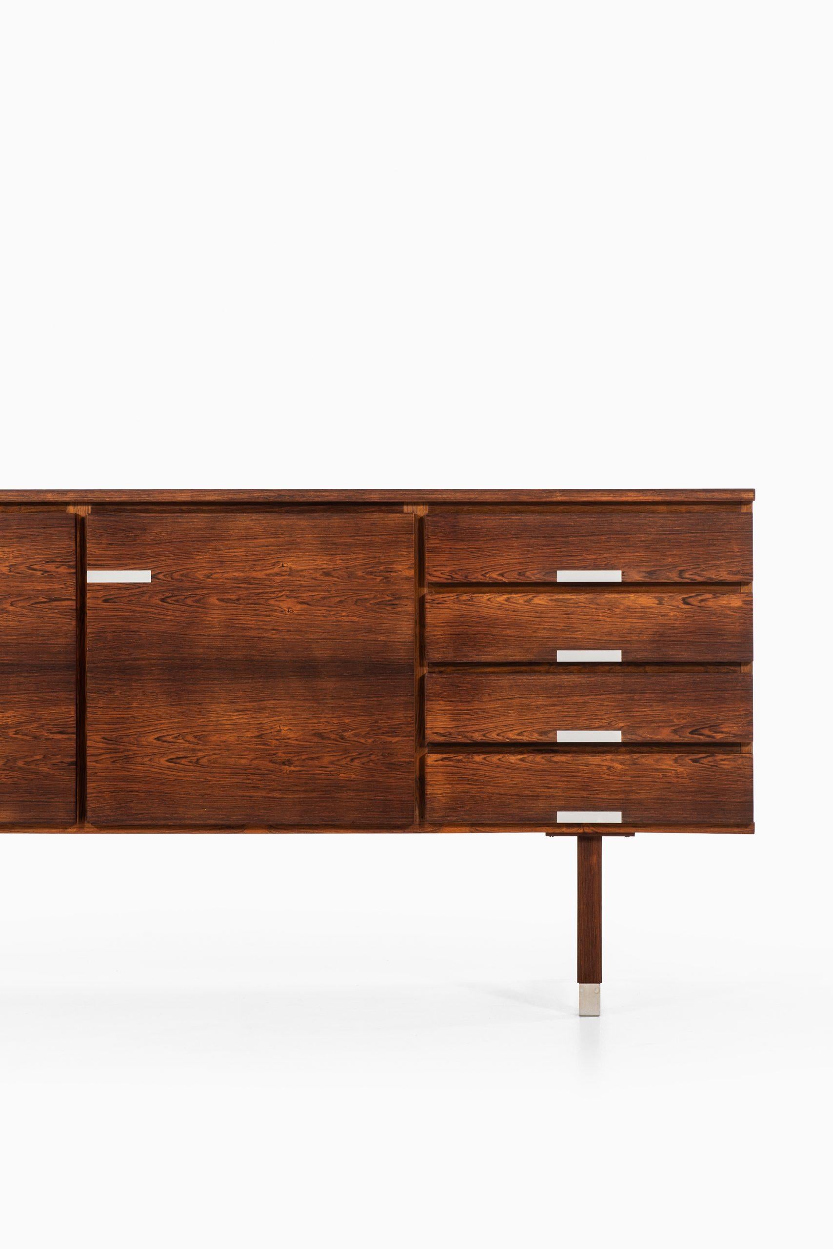 Rare sideboard in rosewood designed by Kai Kristiansen. Produced by Preben Skov Andersen, PSA Furniture in Denmark.