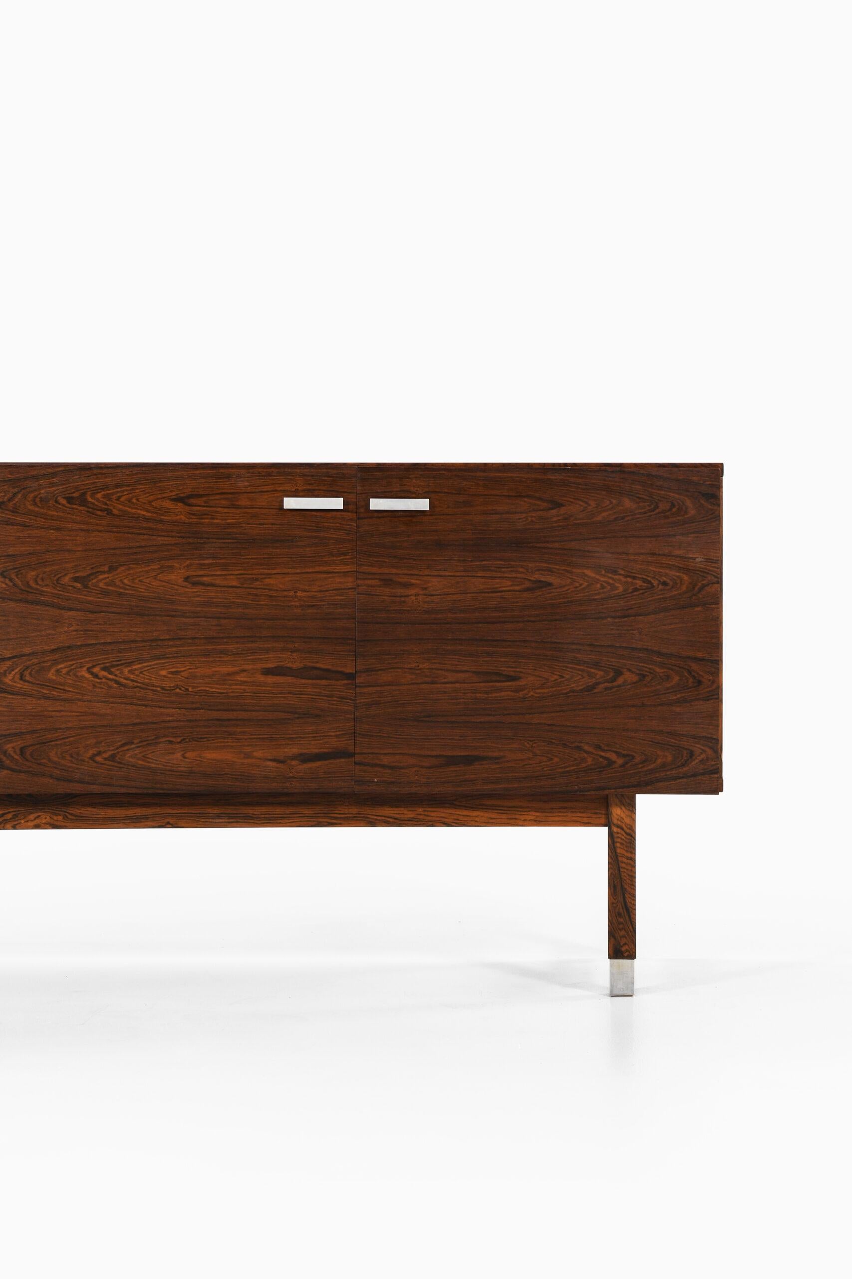 Rare sideboard in rosewood designed by Kai Kristiansen. Produced by Preben Skov Andersen, PSA Furniture in Denmark.