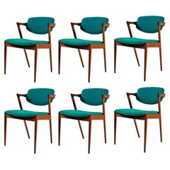 Sechs vollständig restaurierte Teakholz-Esszimmerstühle von Kai Kristiansen Inc. mit individueller Neupolsterung