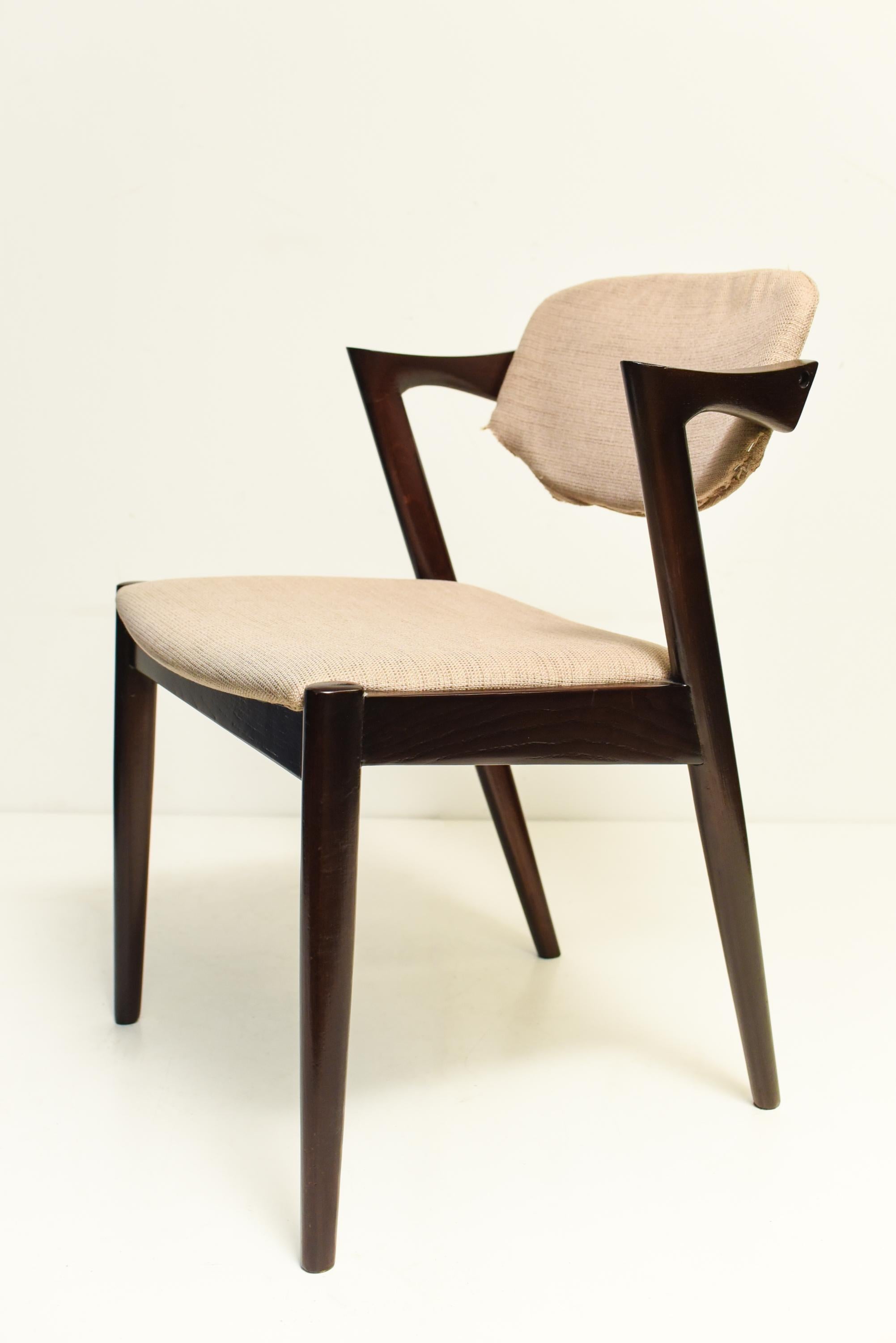Mid Century Kai Kristiansen swivel model 42 chair in oakwood, 1960s.
 