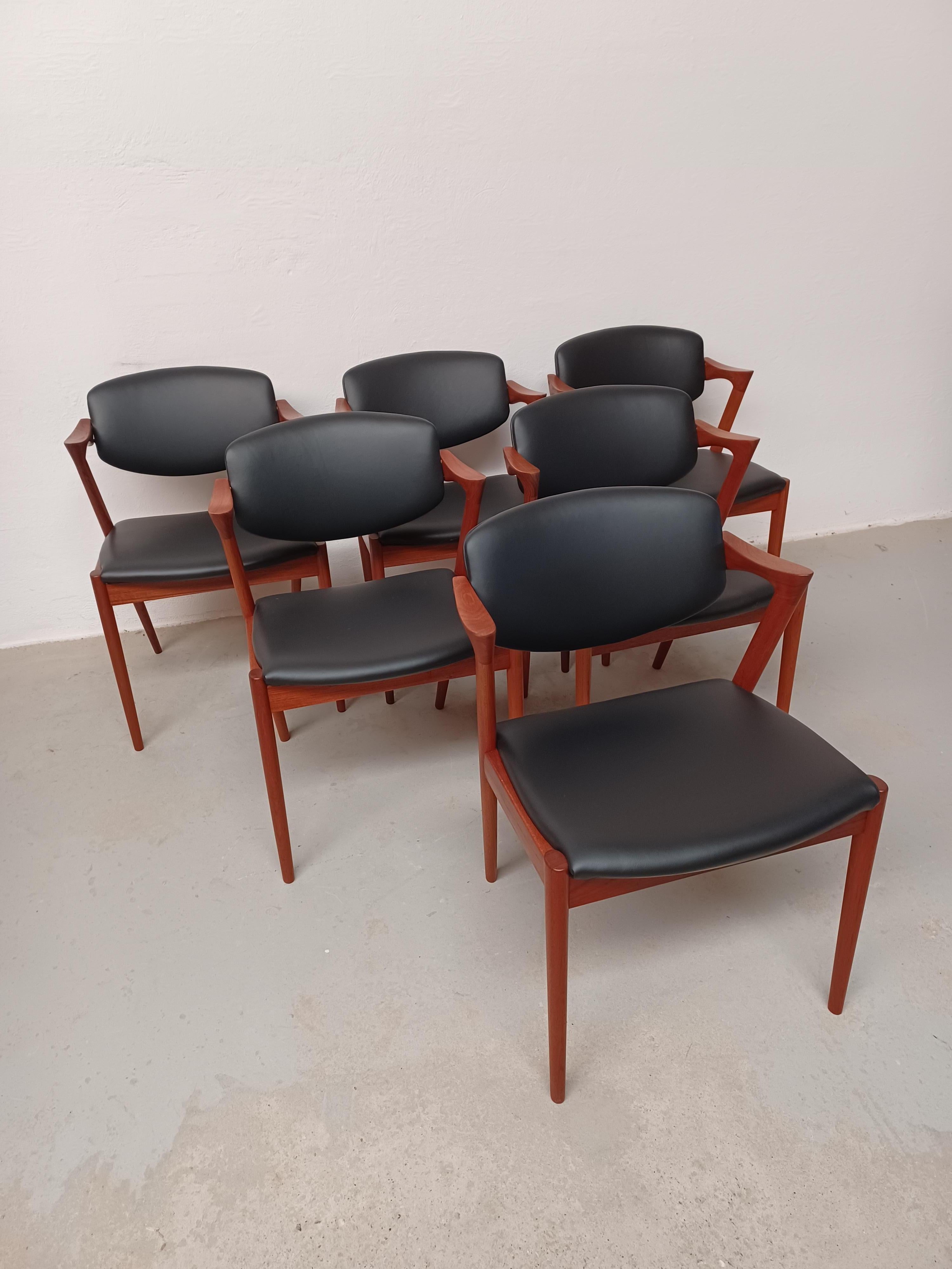 Kai Kristiansen Six Fully Restored Teak Dining Chairs including  Custom Reupholstry.

The chairs have Kai Kristiansens typical light and elegant design that make them fit in easily where you want them in your home - a design that was so uniqe that