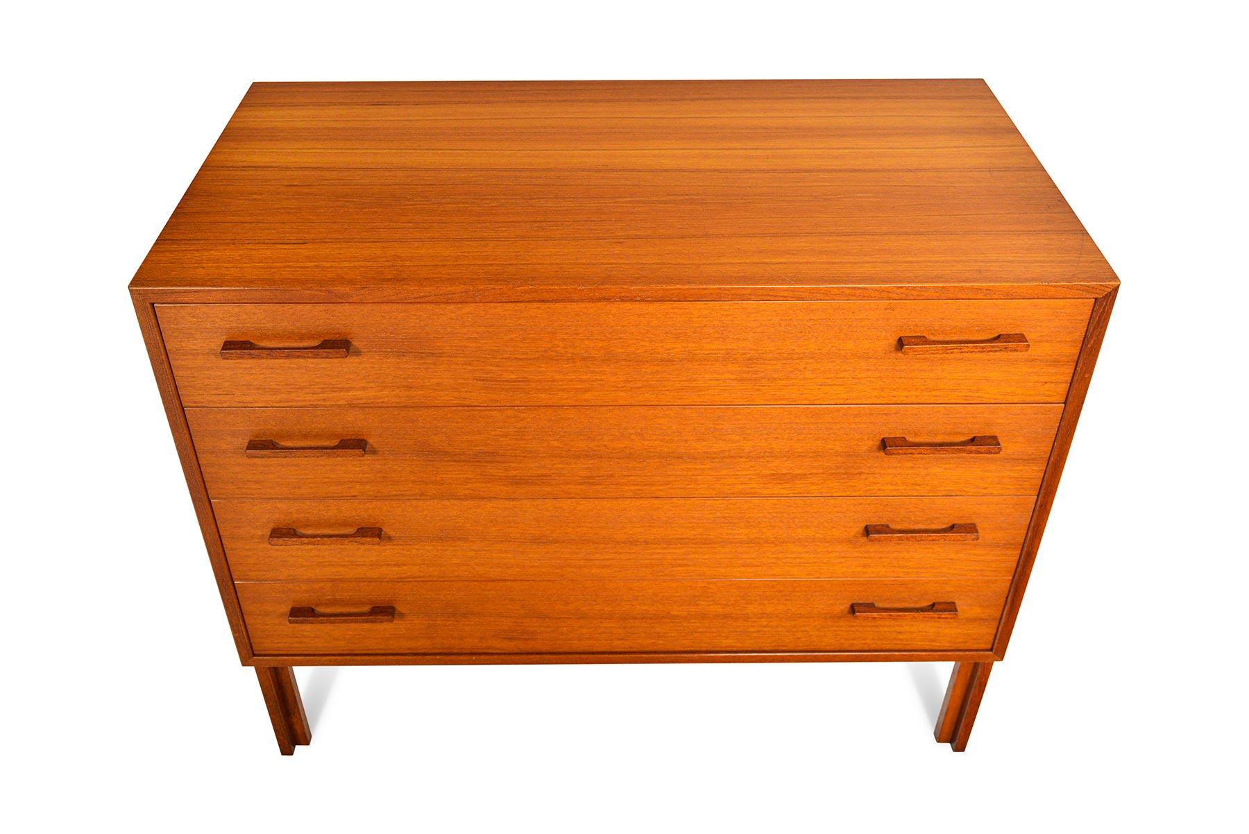 This handsome Danish modern Kai Kristiansen for Feldballes Møbelfabrik four drawer gentleman’s chest in teak is the perfect storage piece for any modern home. Case stands on original tapered teak base. In excellent original condition.

  
