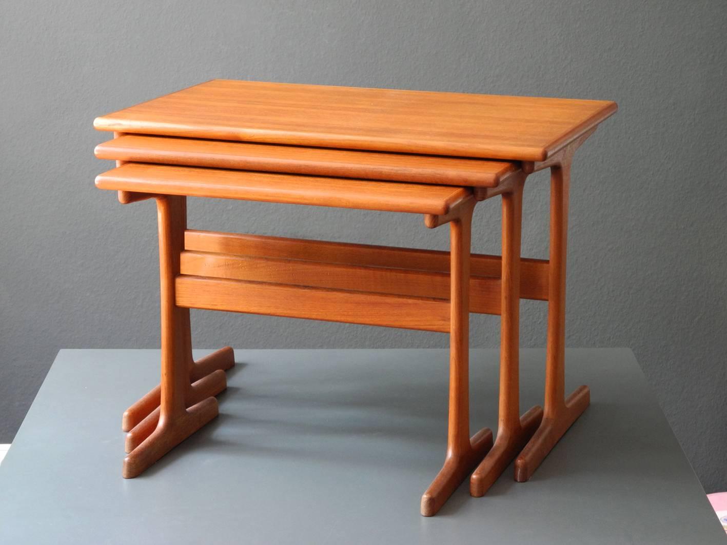 Original 1960s Kai Kristiansen teak set of three tables, side tables, nesting tables. Made in Denmark by Vildbjerg Møbelfabrik.
Beautiful minimalist Danish design in a fantastic vintage condition.
No damages to all three tables, not wobbly and