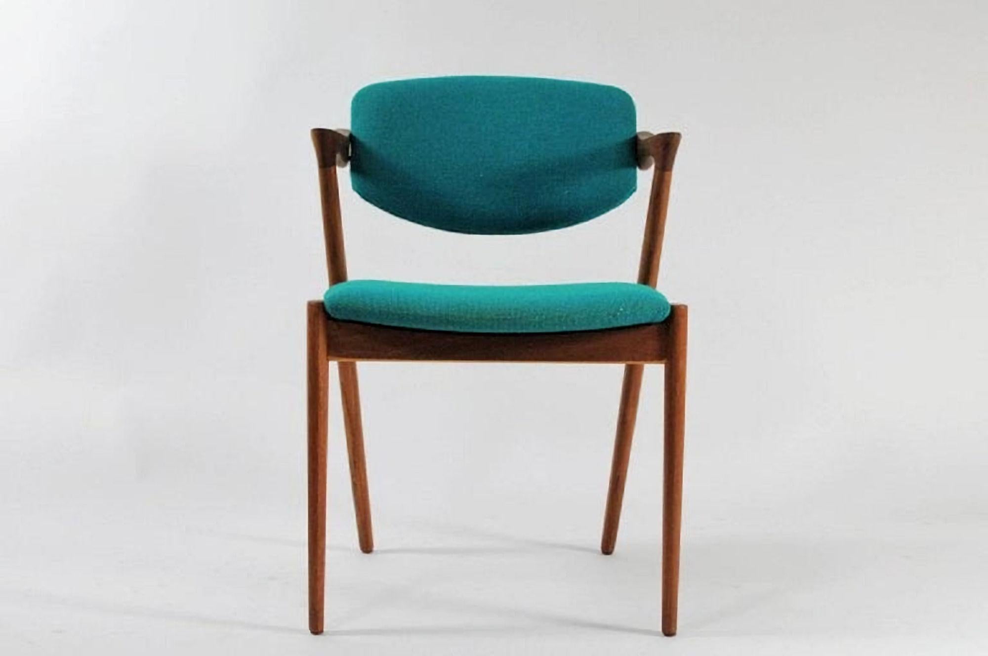 Kai Kristiansen Ten Fully Restored and Customized Model 42 Teak Dining Chairs by  by Kai Kristiansen for Schous Møbelfabrik.

The very comfortable chairs have Kai Kristiansens typical light and elegant design that make them fit in easily where you