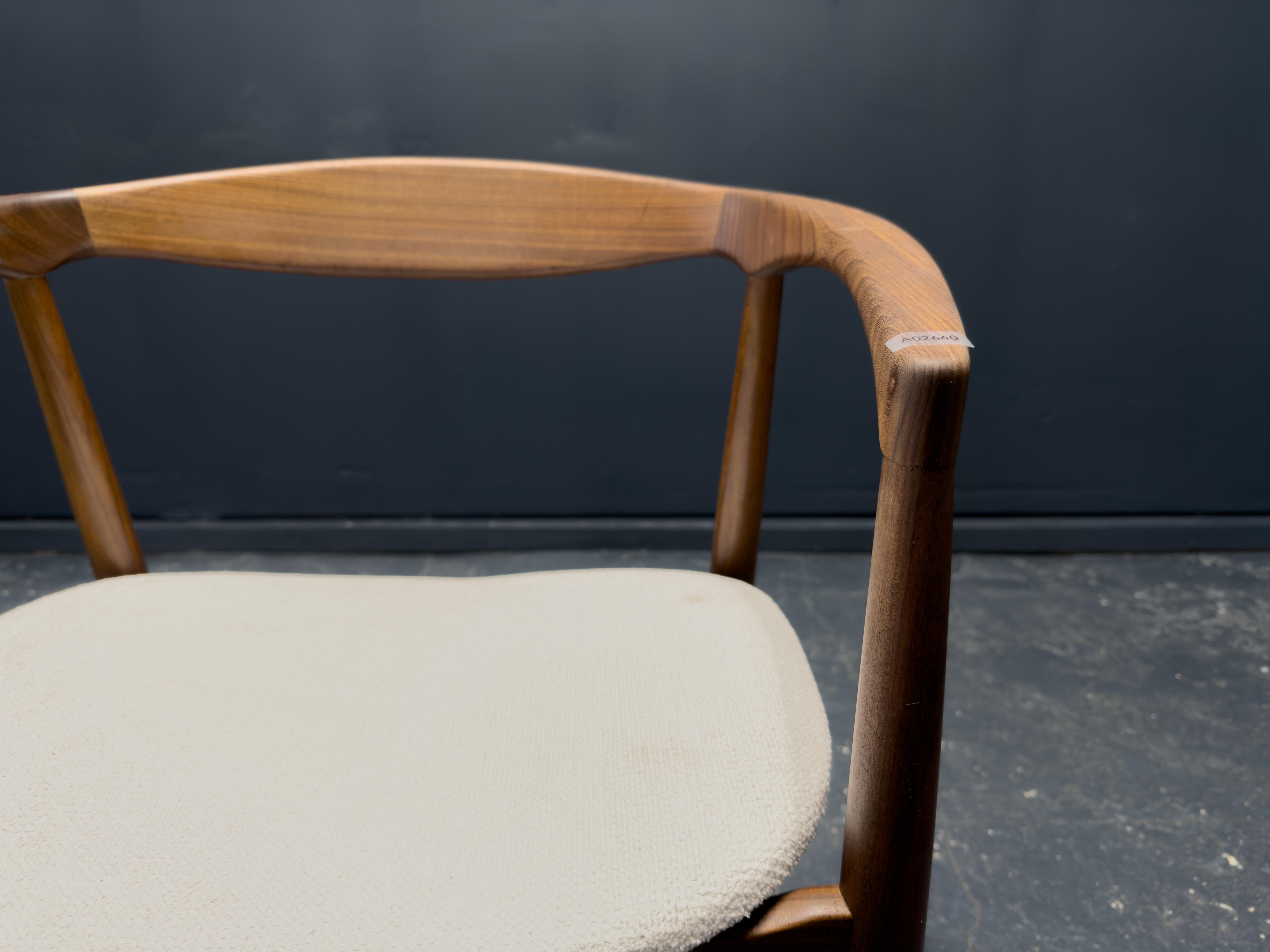 The Troja chair, designed by Kai Kristiansen for IKEA in the 1950s, is an elegantly crafted piece that embodies the refined simplicity of mid-century design. Constructed from teak, the chair features gracefully sculpted lines, a curved backrest, and