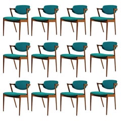 1960's Kai Kristiansen Twelve Restored Teak Dining Chairs Inc. Custom Upholstery