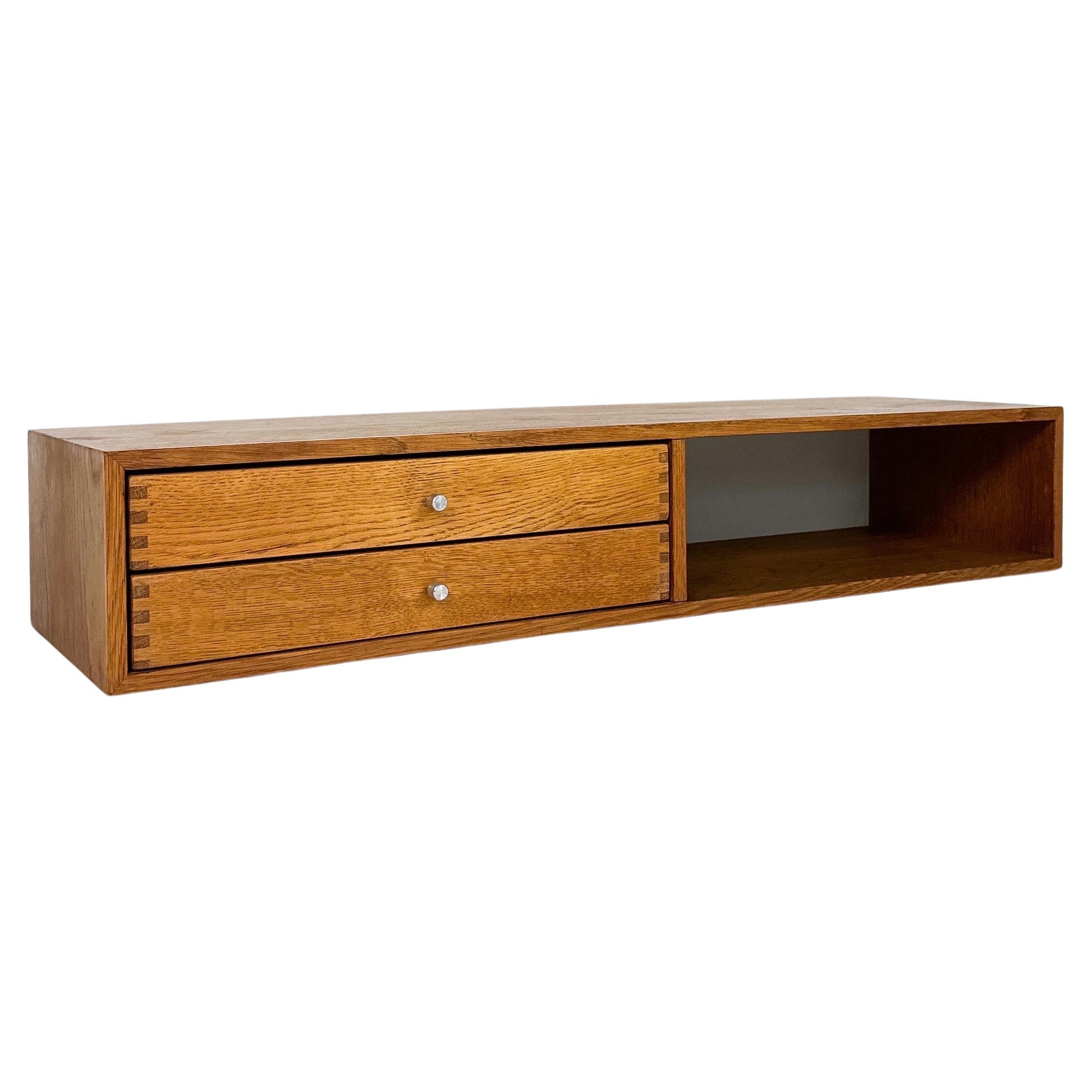 Kai Kristiansen double wall unit, model No. 132 in oak, made by Aksel Kjersgaard in Denmark in the 1960s.

Serves as a beautiful entrance furniture, shelf or bedside table. Two pull out drawers in solid oak. Stamped on backside.

Very good