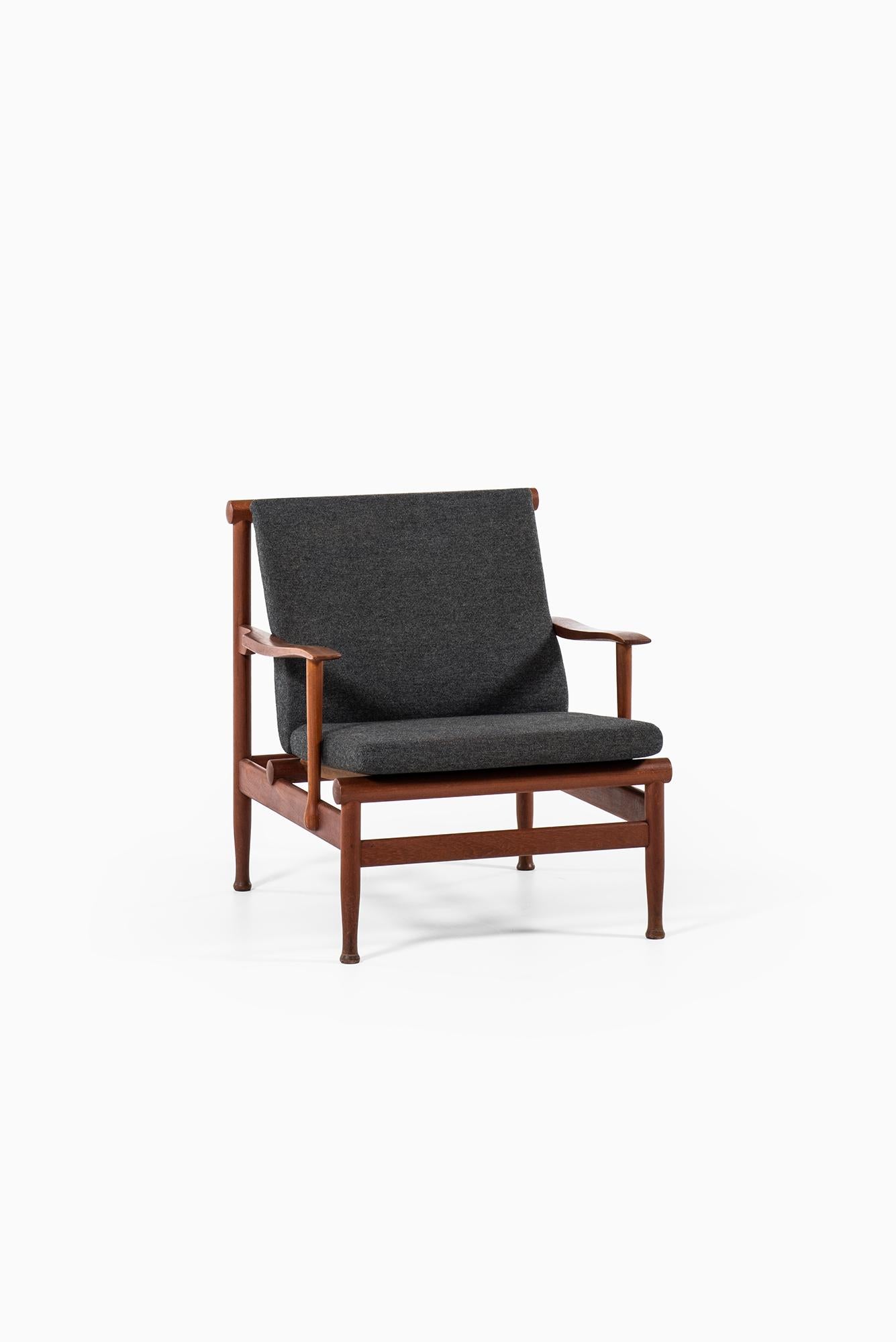 Rare easy chair designed by Kai Lyngfeldt Larsen. Produced by Søborg møbler in Denmark.