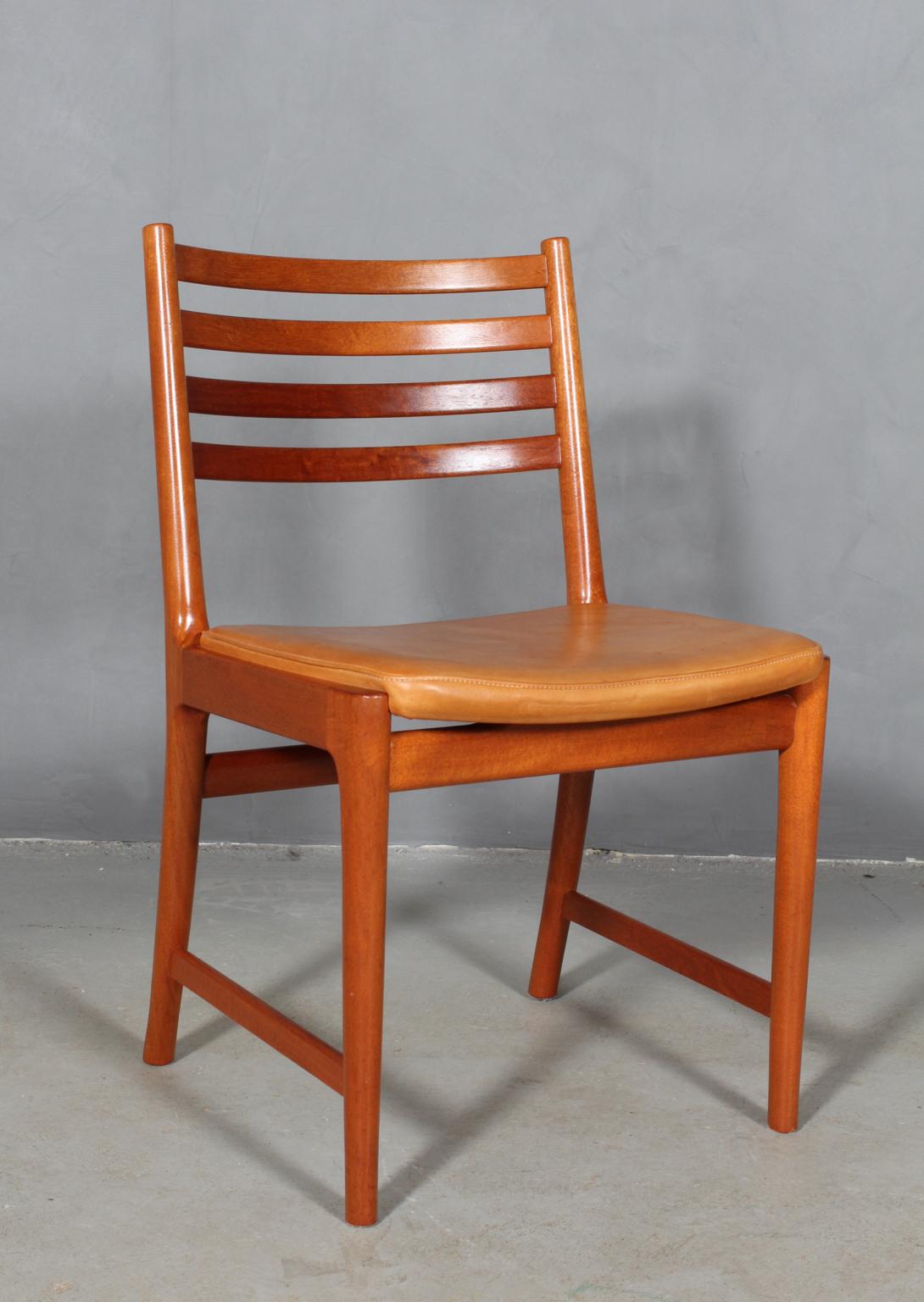 Danish Kai Lyngfeldt Larsen four dining chairs, mahogany and original Vegetal leather.