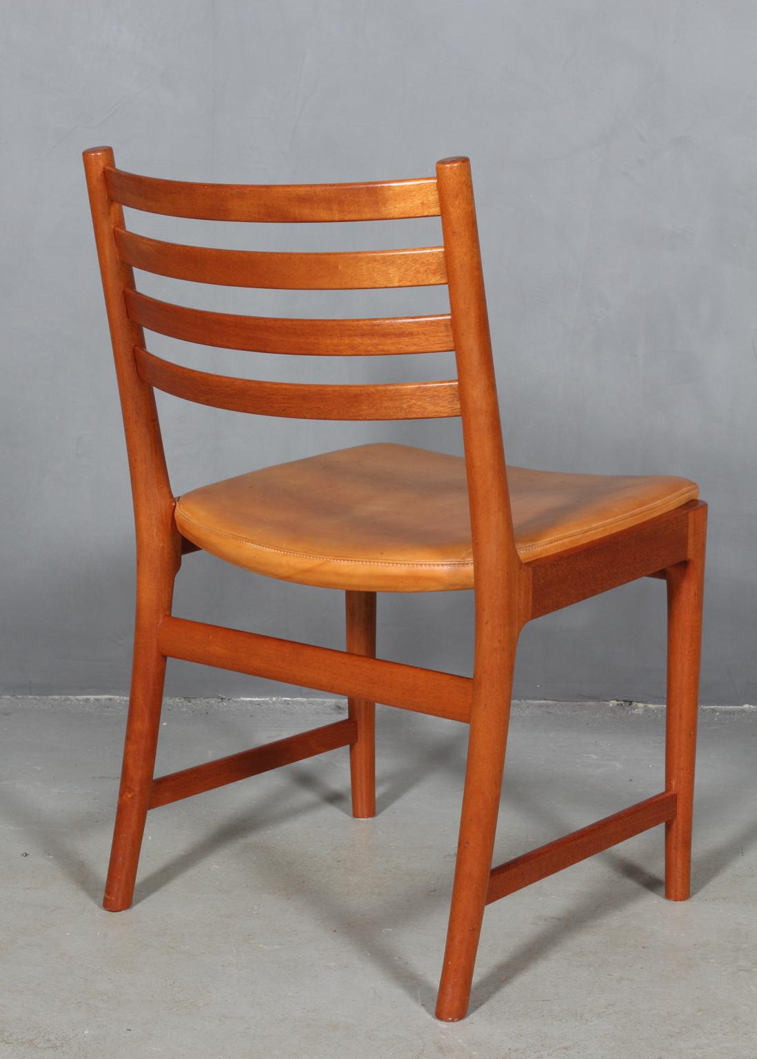 Kai Lyngfeldt Larsen four dining chairs, mahogany and original Vegetal leather. 1