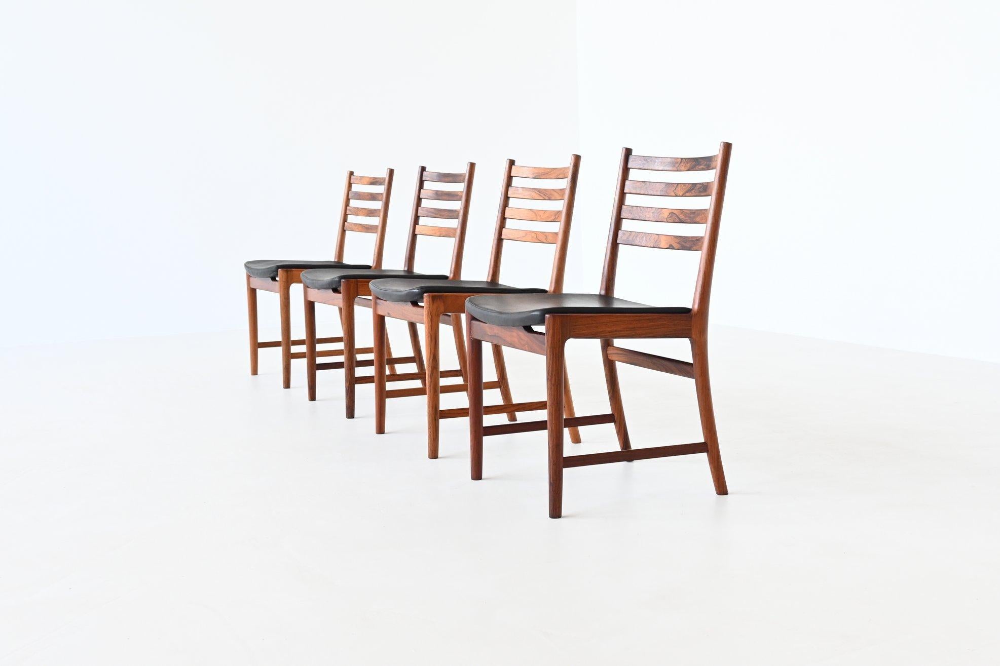 Amazing set of four beautiful shaped and well-crafted dining chairs designed by Kai Lyngfeldt Larsen and manufactured by Søren Willadsen, Denmark 1960. These chairs are made of nicely grained solid Brazilian rosewood and the seats are upholstered