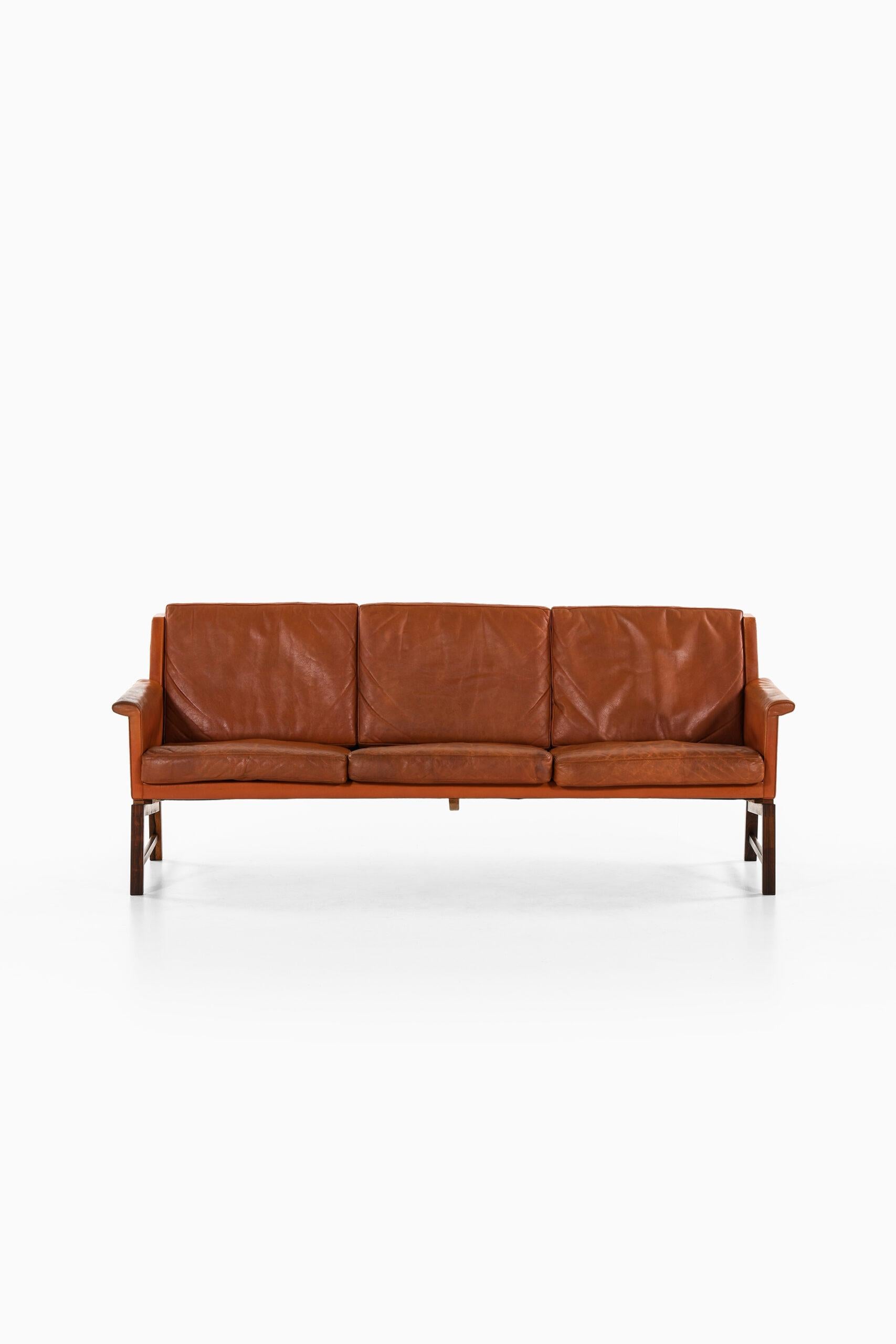 Rare sofa designed by Kai Lyngfeldt Larsen. Produced in Søborg Møbler in Denmark.