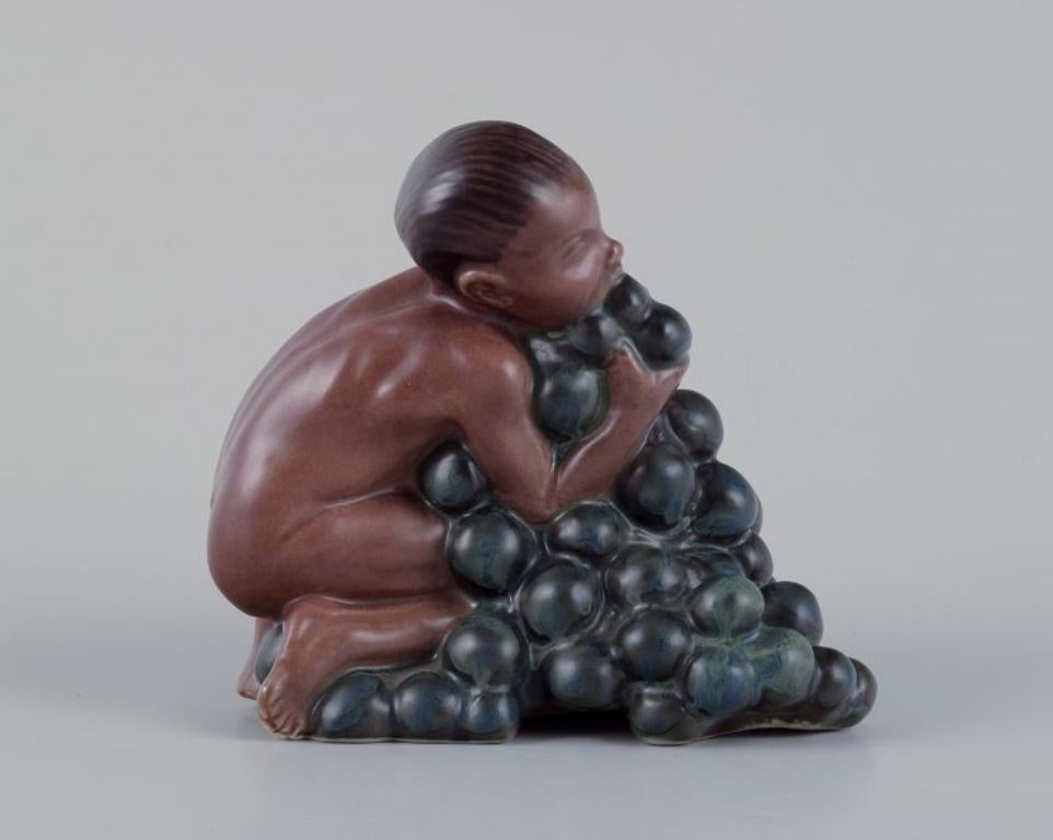 Kai Nielsen (1882-1924) for Bing & Grøndahl. 
Stoneware figurine depicting 