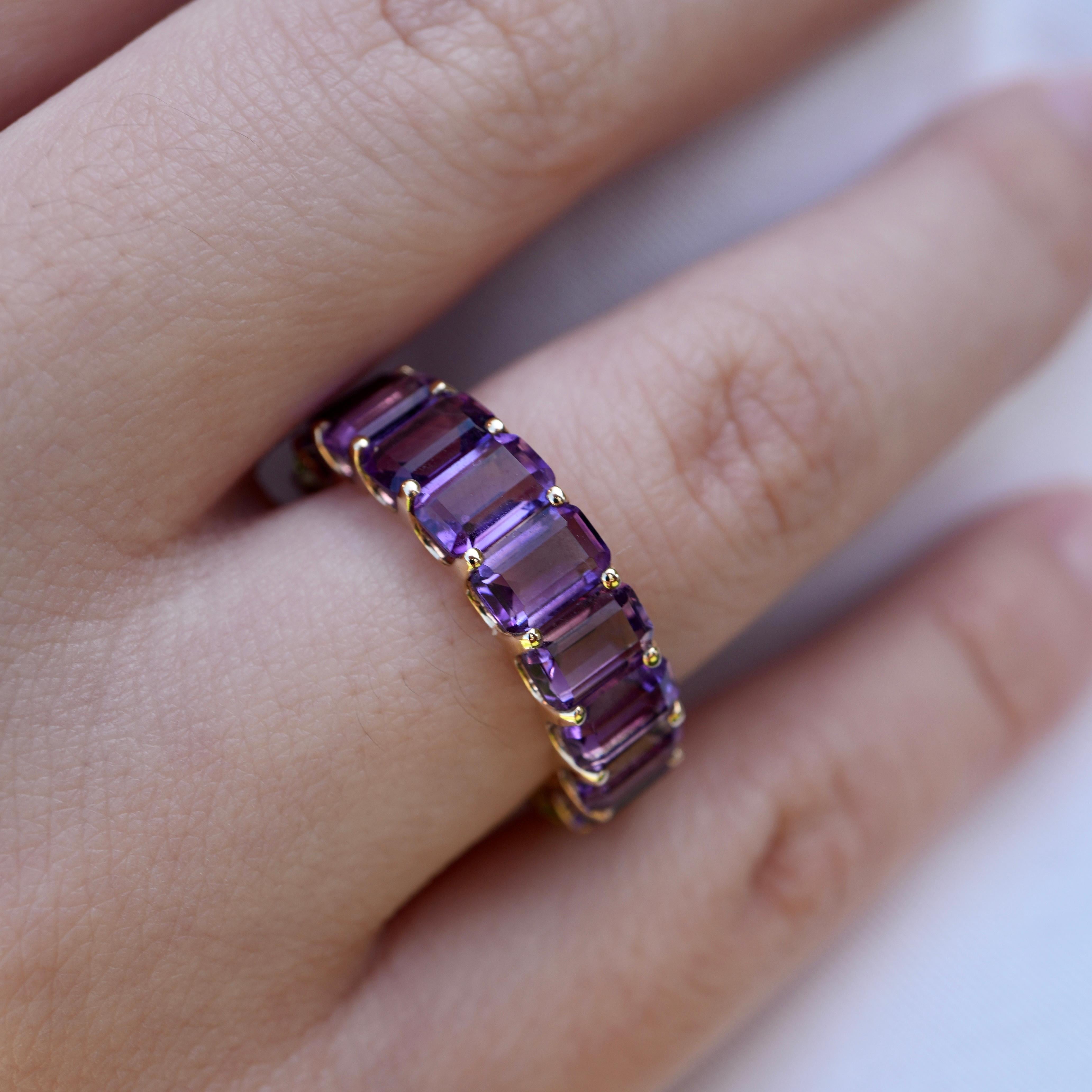 Celebrate vibrant duality with our Amethyst & Peridot Duo Eternity Ring in 14K solid gold. Featuring alternating emerald-cut birthstones in a full eternity band, this eye-catching design is both playful and elegant—perfect for those who want a ring