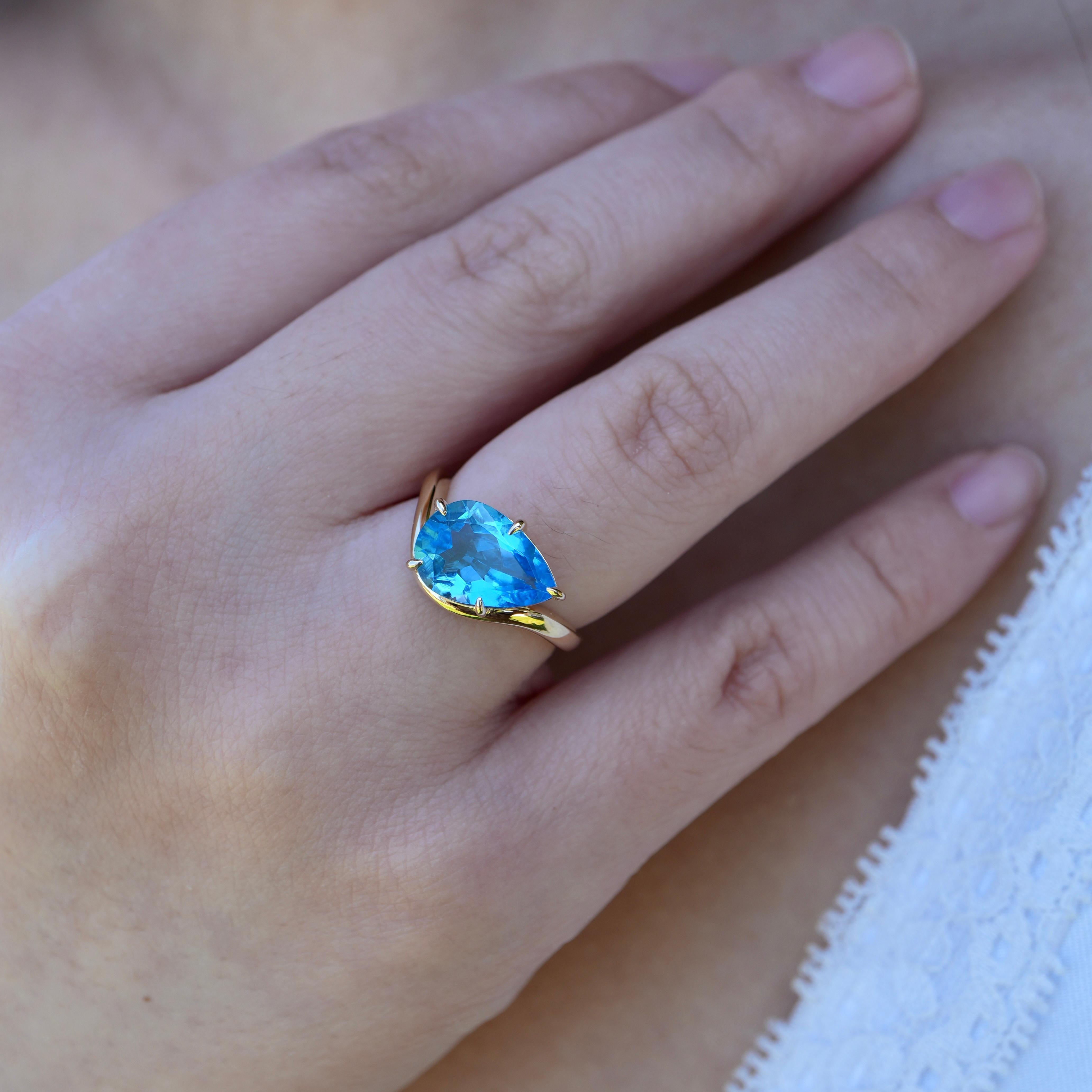 Pear Cut Kai Ocean Wave Swiss Blue Topaz East-West Ring For Sale