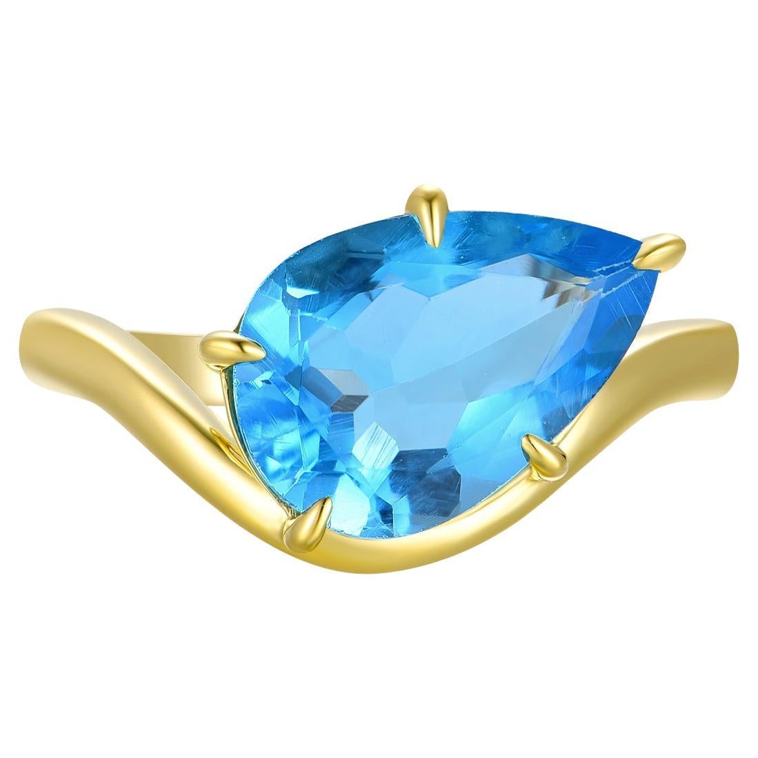 Kai Kai Vague de l'océan Bague est-ouest en topaze bleue suisse