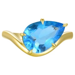 Kai Kai Vague de l'océan Bague est-ouest en topaze bleue suisse