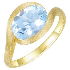 Kai Oval 2CTW AAA-grade Aquamarine Eternal Wave East-West Ring