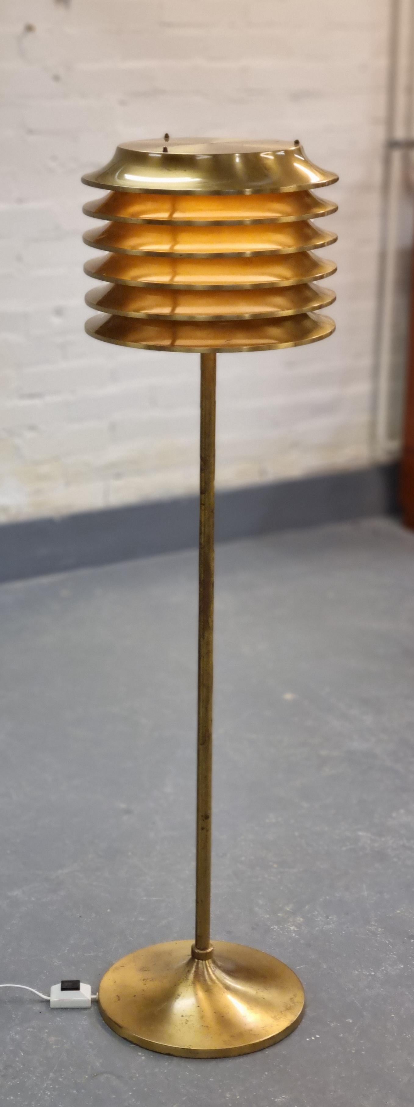 This lamp was designed by Kai Ruokonen, originally for the Vaakuna Hotel in Helsinki in the 1970s. The same model was also used later in the Palace Hotel Helsinki. A very simple yet elegant heavy duty lamp in full brass with a beautiful