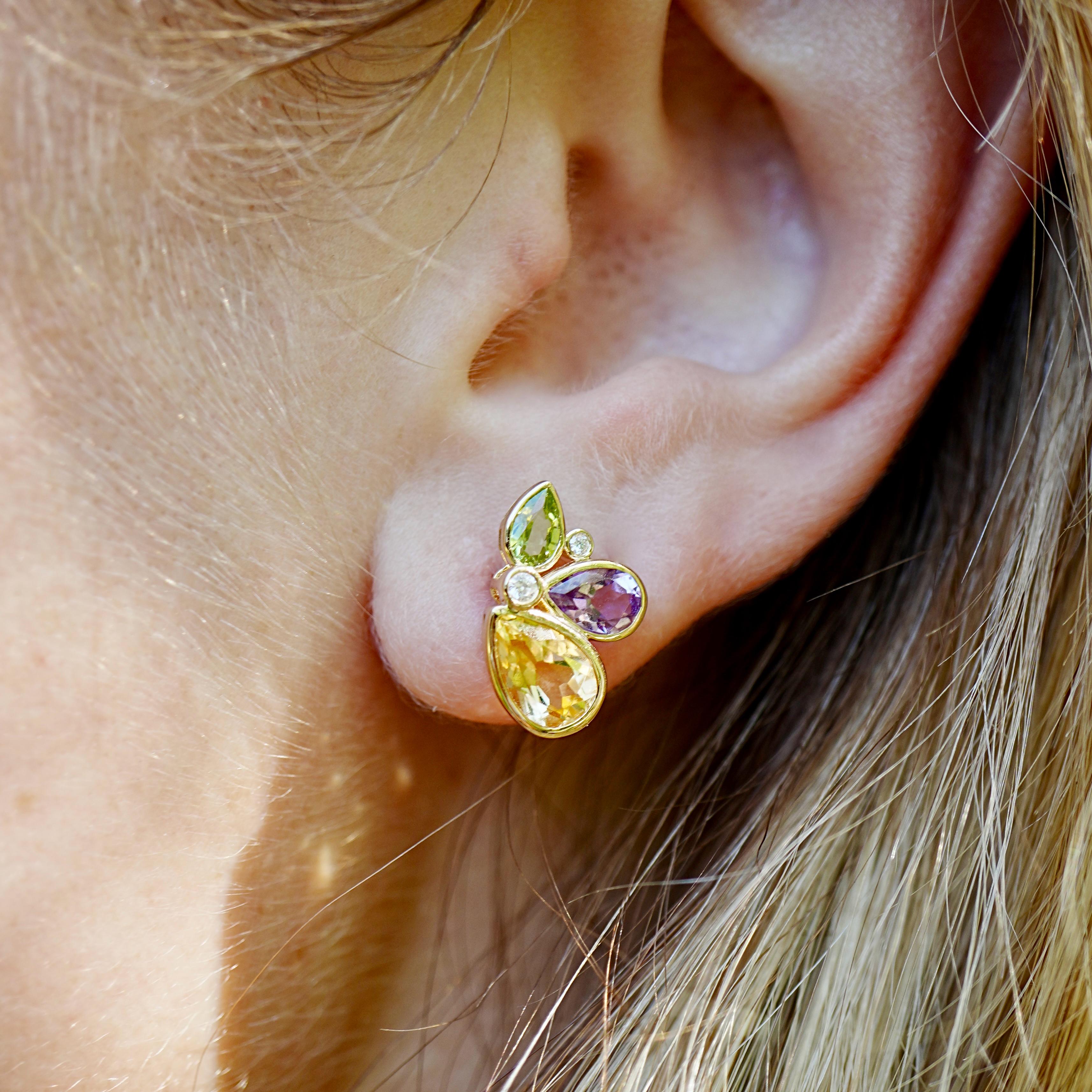 Brillantes, juguetones y llenos de color, los Pendientes de Diamantes Multigema Mariposa Tropical Kai de 2,76 quilates celebran la belleza de la naturaleza con un toque refinado. Cada pendiente presenta una animada combinación de citrino, peridoto y