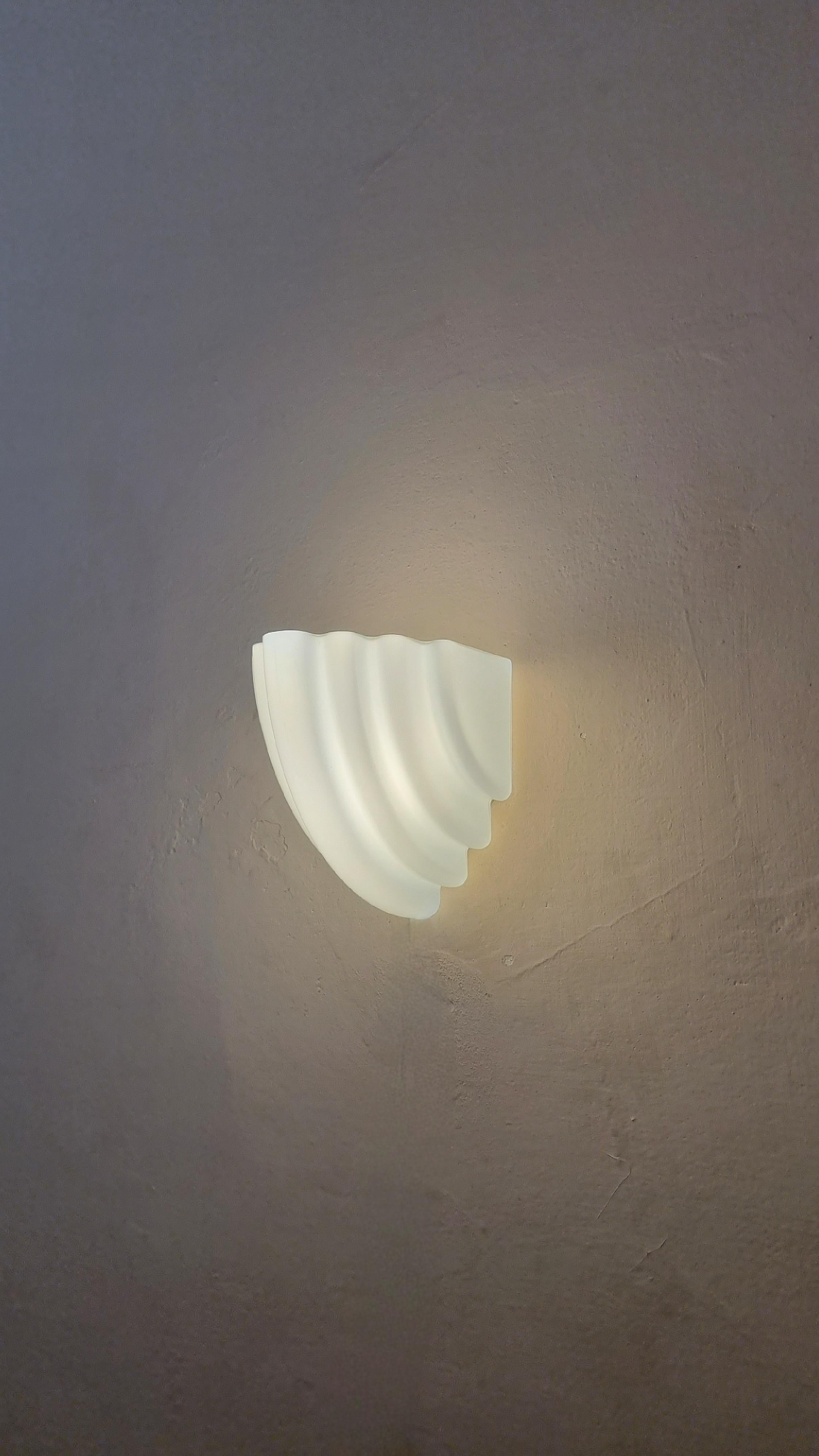 Kai  Wall sconce designed by  Kazuhide Takahama for Sirrah, Italy 1980s.
Opal glass structure, plastic.
Excellent condition.

Kazuhide Takahama (1930 - 2010) was born on the Japanese island of Kyushu. In 1953 he graduated from the Tokyo Institute of