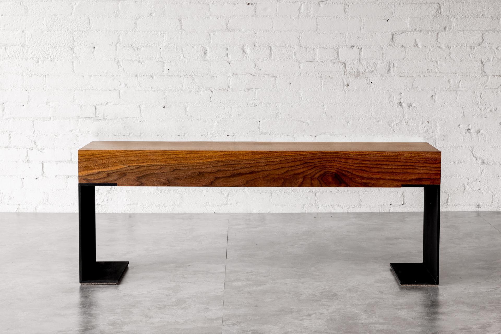 Introducing the epitome of modern luxury and functionality – the Kai Walnut Bench by Autonomous Furniture. Crafted with precision and passion by renowned designer Kirk Van Ludwig, this bench is more than just a piece of furniture; it's a statement