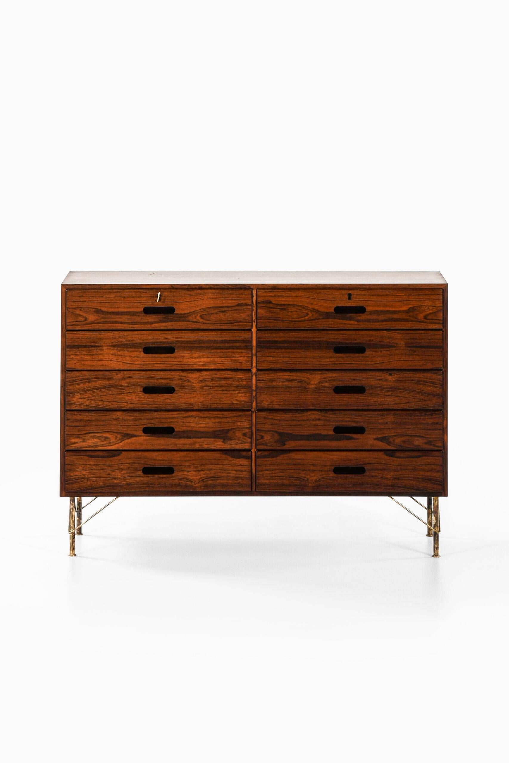 Rare bureau / sideboard designed by Kai Winding. Produced by Poul Hundevad Møbler in Denmark.
A pair available.